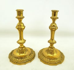 Pair of Antique Louis XIV Styled Gilt Bronze Candlesticks with Stylized Flowers