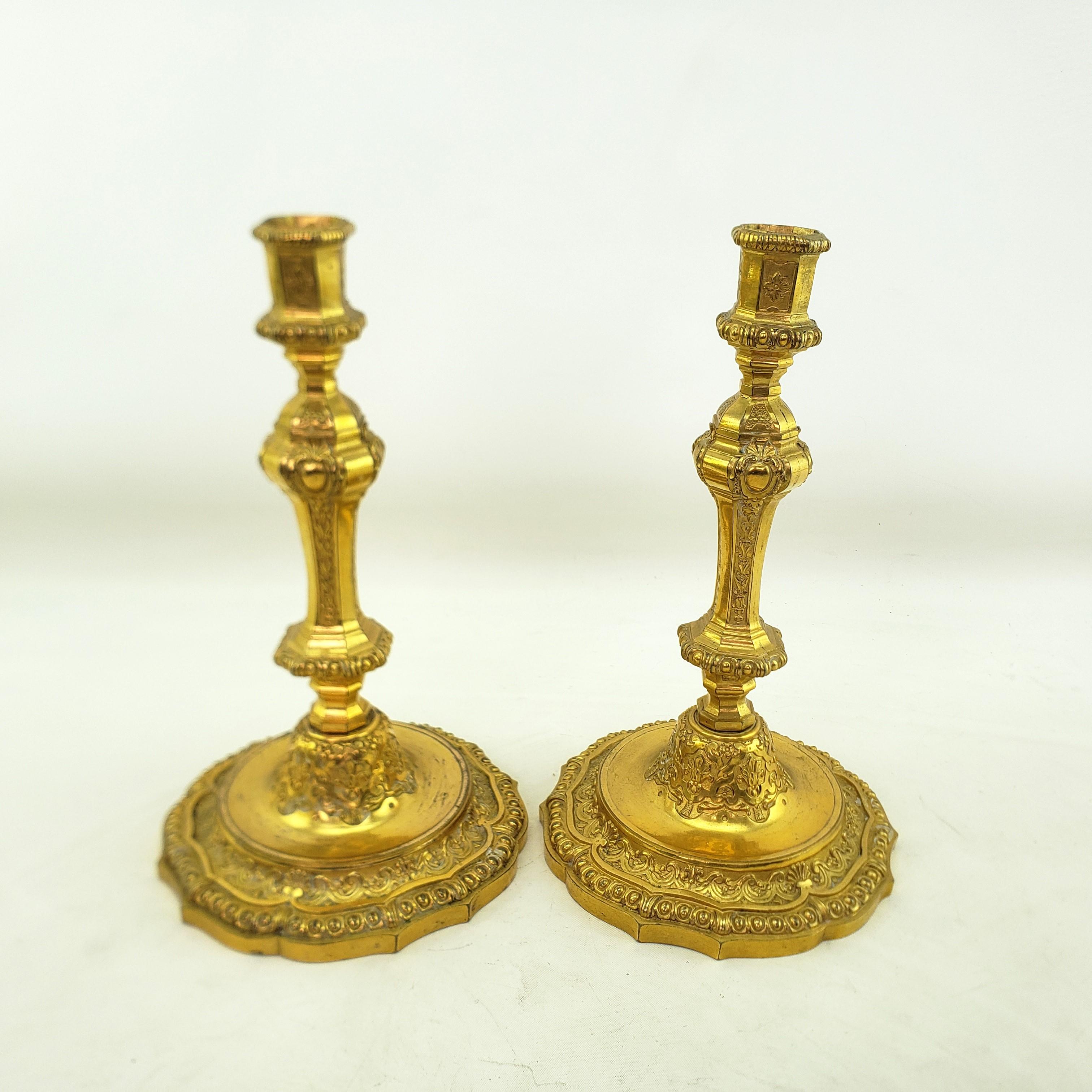 French Pair of Antique Louis XIV Styled Gilt Bronze Candlesticks with Stylized Flowers For Sale