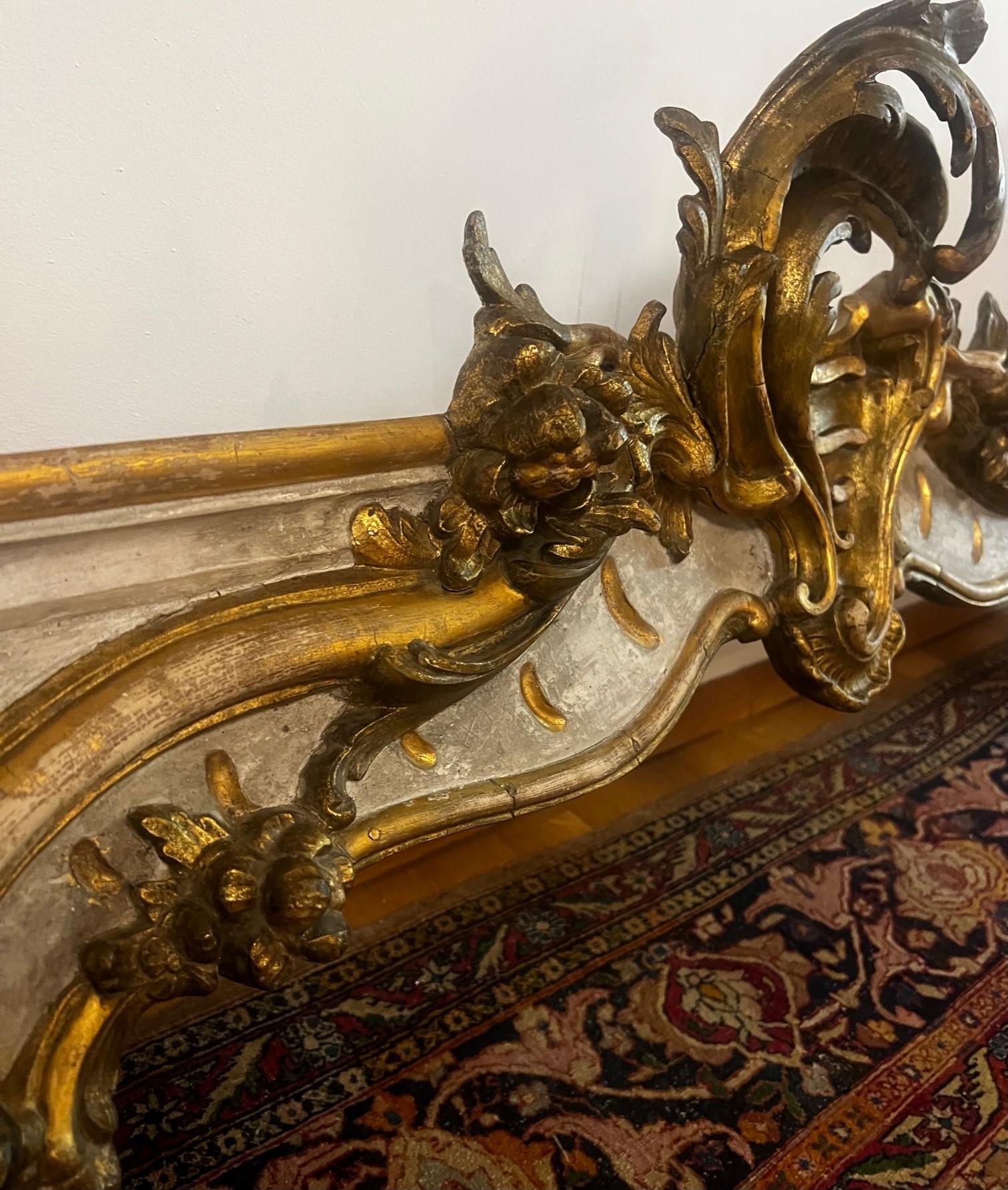 Magnificent set of two Baroque French Valances (Pelmets in UK) represents an era of Louis XV palaces accessories. Hand carved and gold gilded these two Pelmets have a unique and most royal look. Usually, Pelmets supposed to hung over windows where