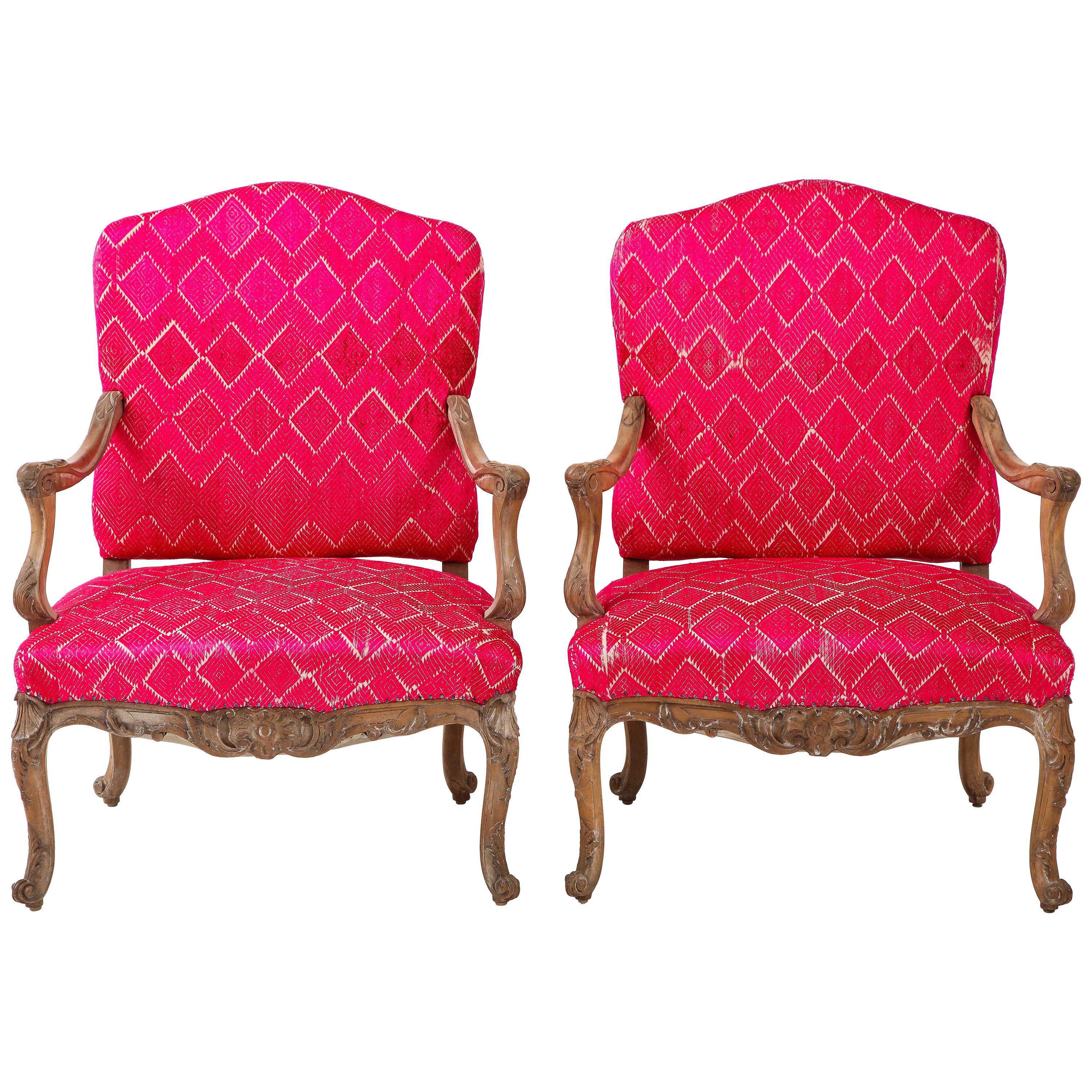 Antique pair of French Louis XV bergère chairs.