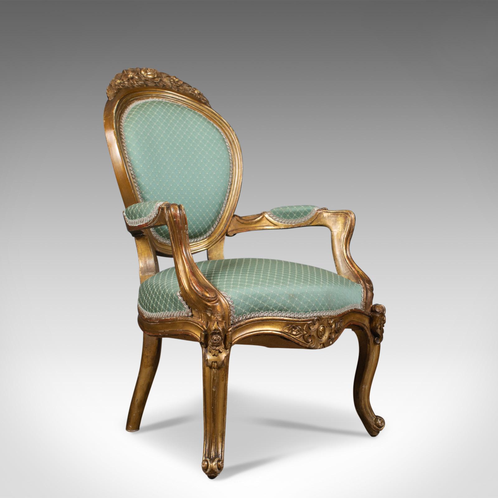 This is a pair of antique Louis XV revival open armchairs. Two French, giltwood chairs dating to the late 19th century, circa 1900.

A pair of quality craftsmanship
Generous proportions offering a comfortable seat
Desirable aged patina

Sturdy