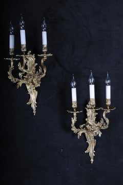 Coppia di lampade da parete/consolle antiche Luigi XV, bronzo