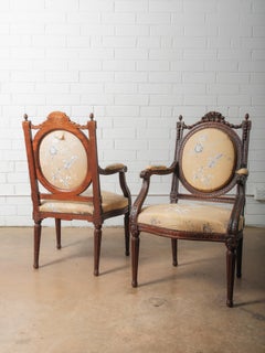 Pair of Antique Louis XVI Style Carved Armchairs with Floral Upholstery