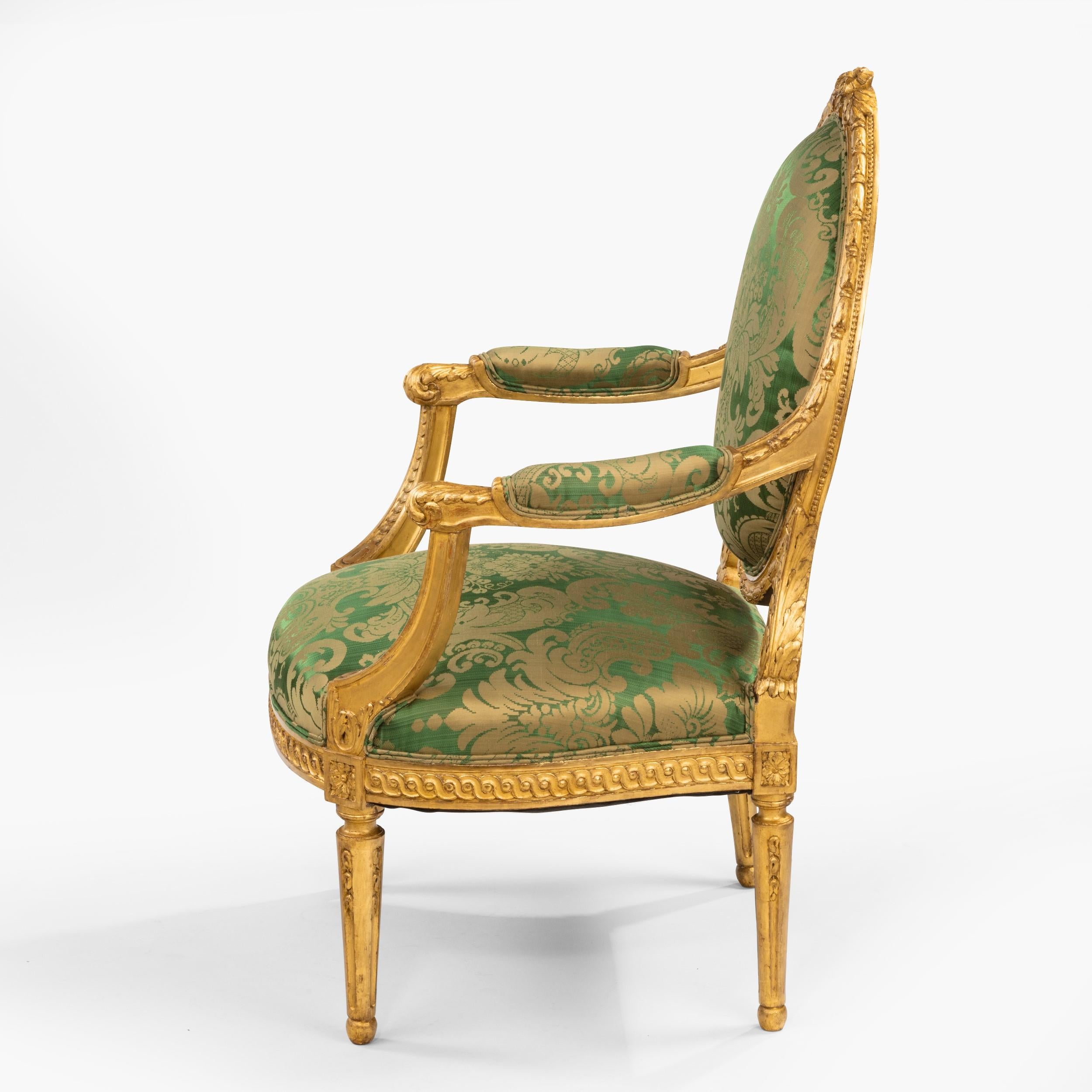 19th Century Pair of Antique Louis XVI Style Carved Armchairs with Green Upholstery