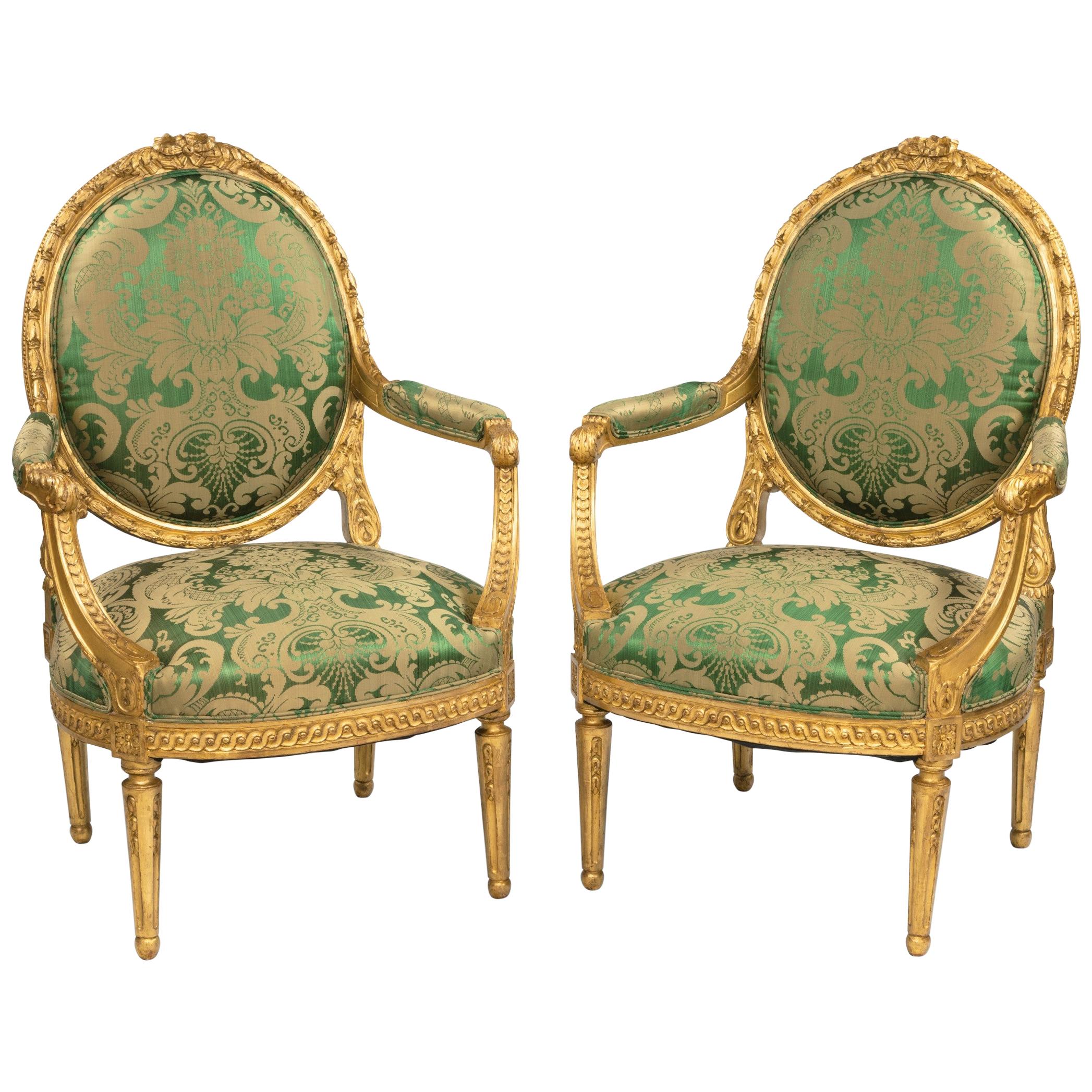 Pair of Antique Louis XVI Style Carved Armchairs with Green Upholstery
