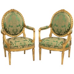 Pair of Antique Louis XVI Style Carved Armchairs with Green Upholstery