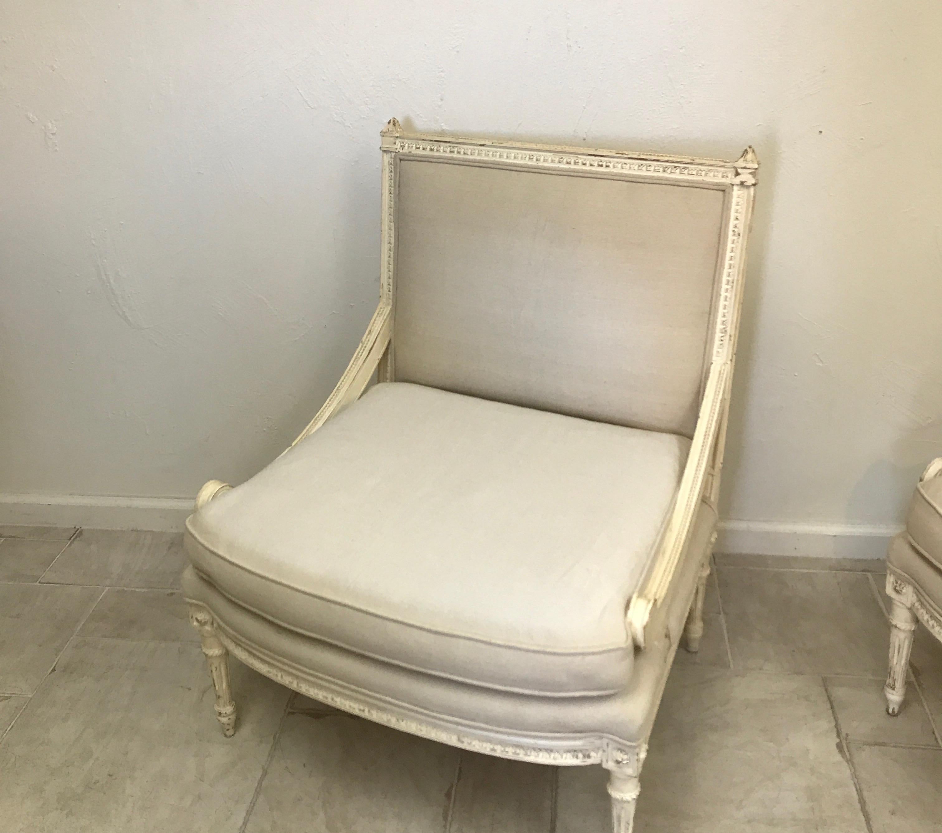 Pair of French Louis XVI style antique slipper chairs.