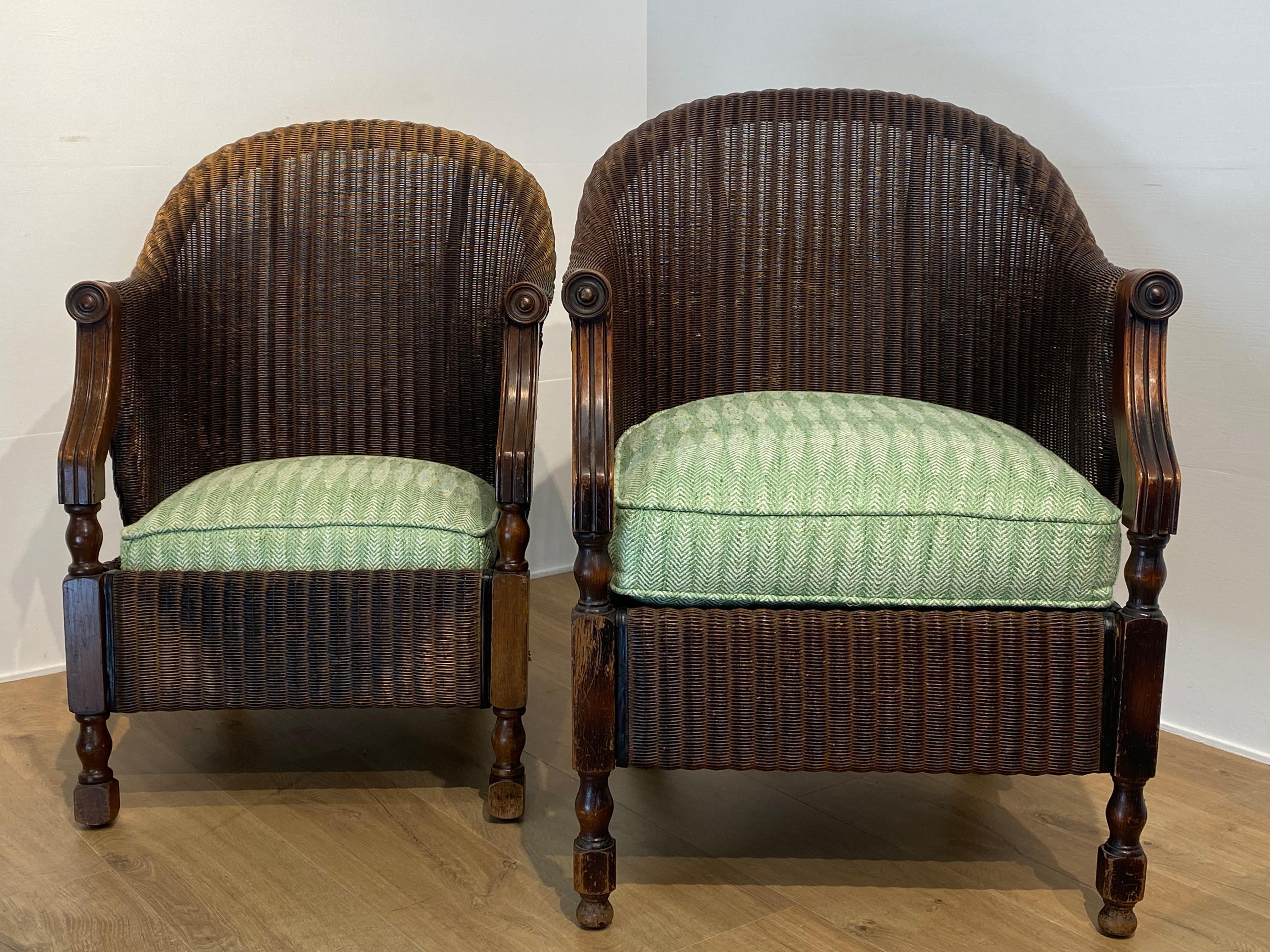 Pair of antique Loyd Loom Chairs In Rattan For Sale 10