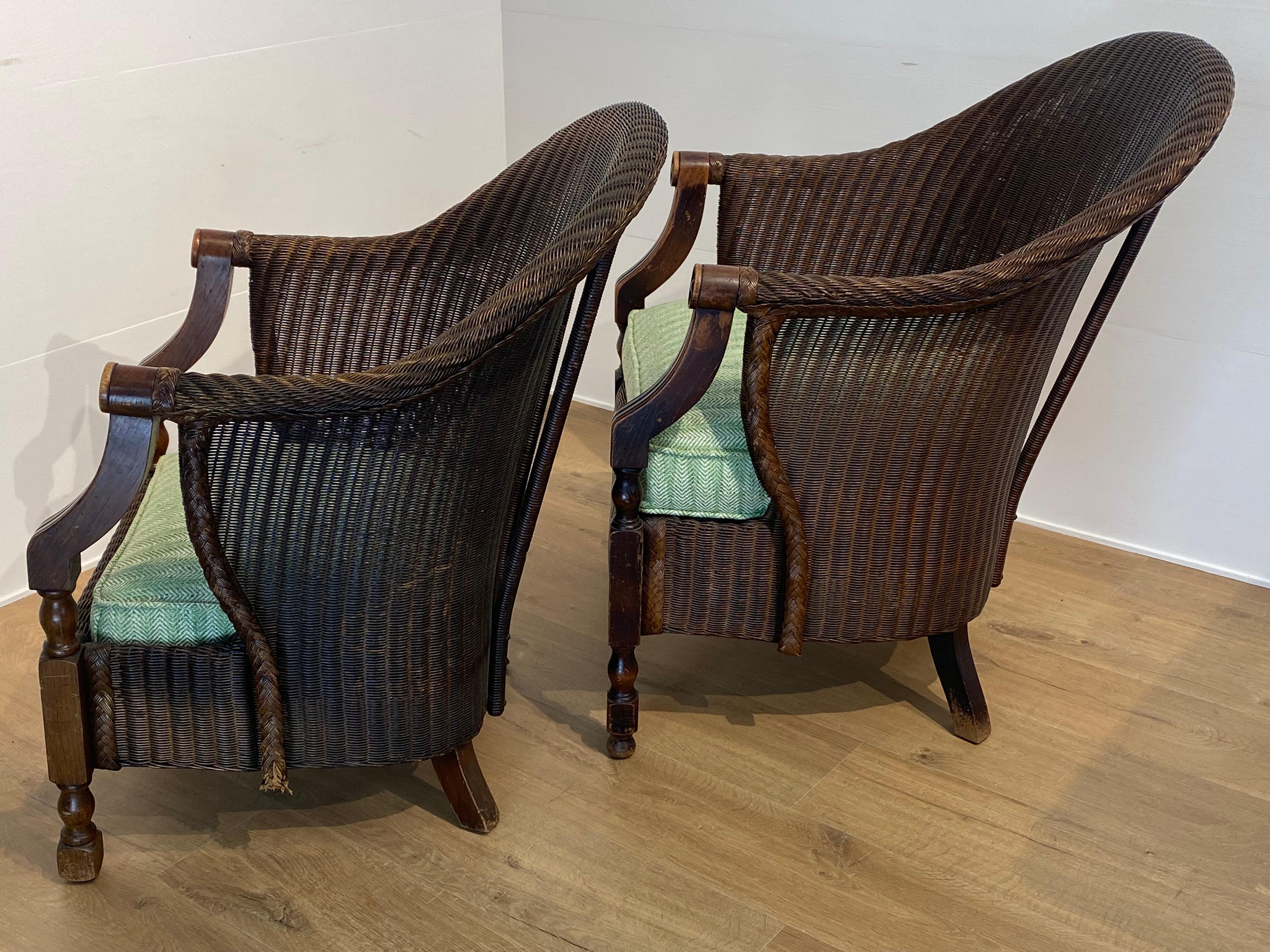 Pair of antique Loyd Loom Chairs In Rattan For Sale 12