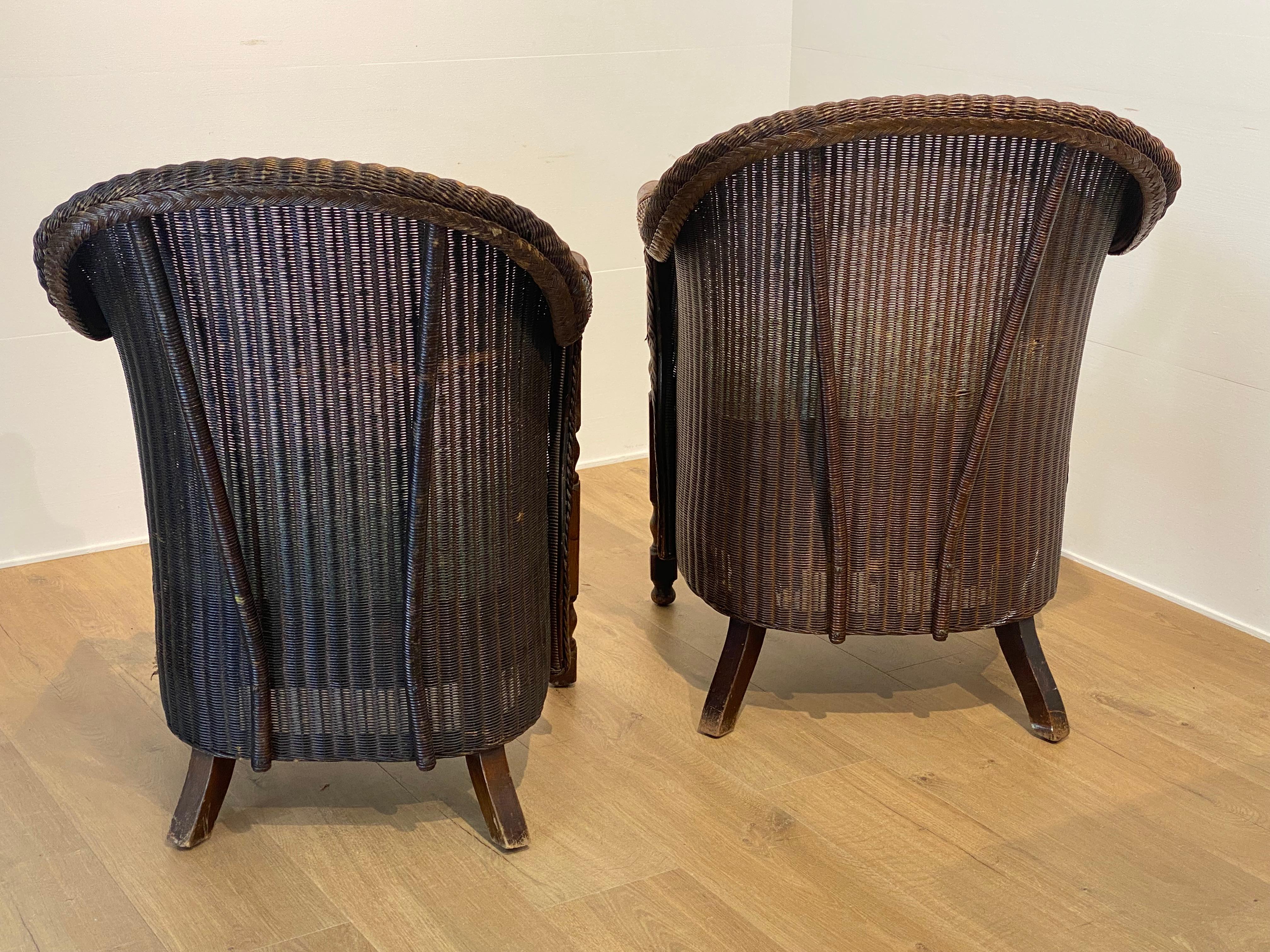 Pair of antique Loyd Loom Chairs In Rattan For Sale 13
