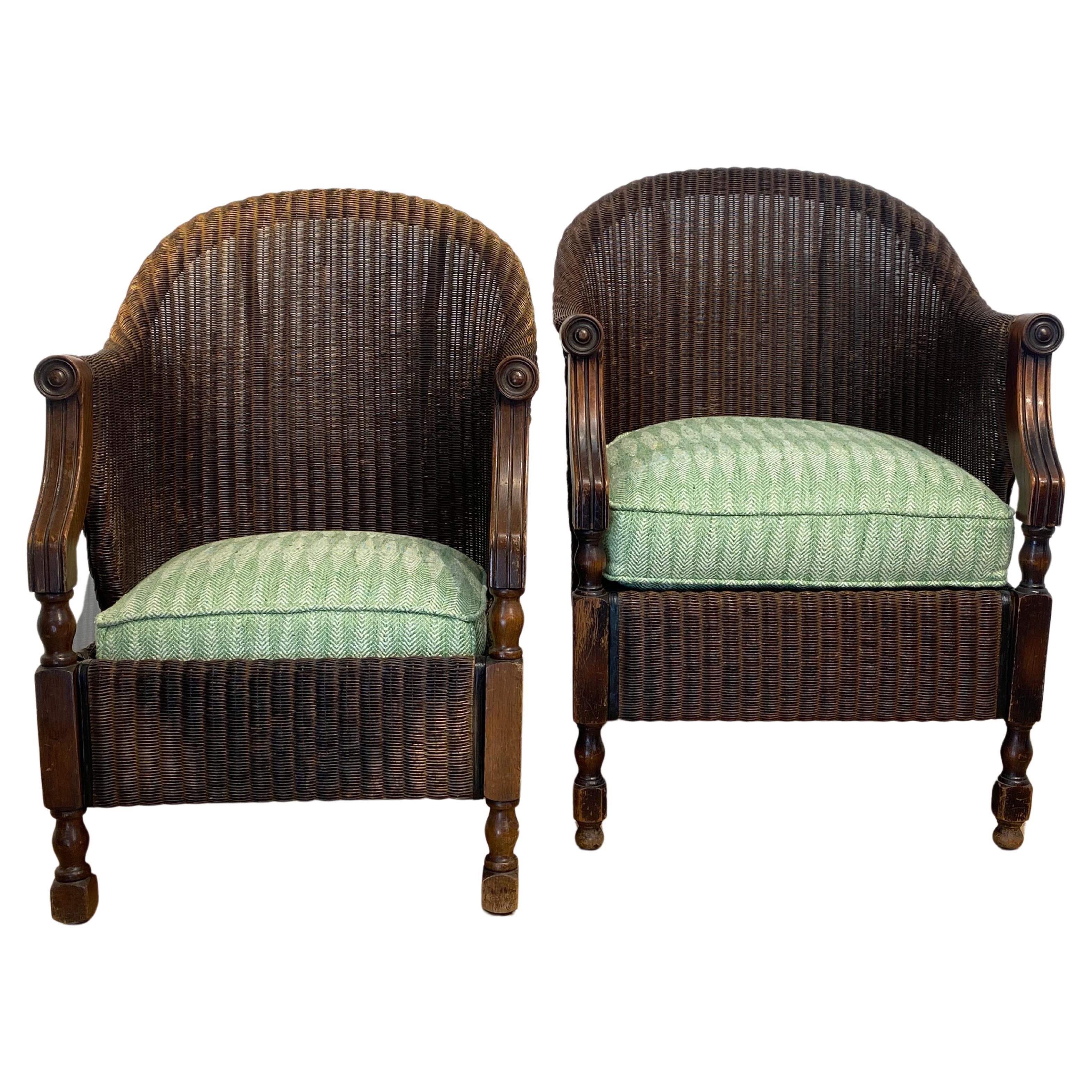 Pair of antique Loyd Loom Chairs In Rattan For Sale