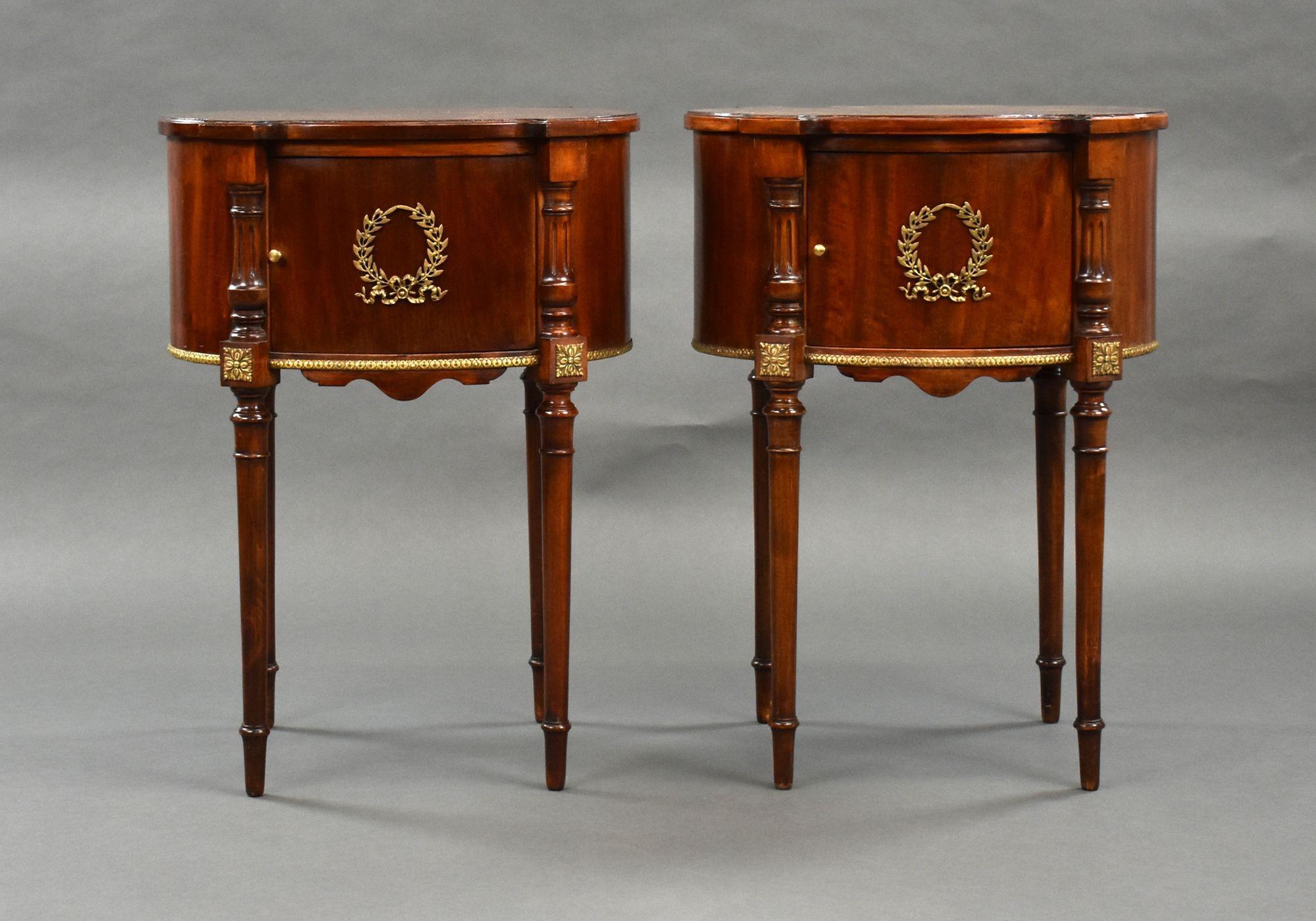 For sale is a good quality pair of French antique bedside tables, having shaped tops above single doors, each with decorative mounts, standing on elegant legs. Each bedside is in very good condition and comes complete with a glass top.