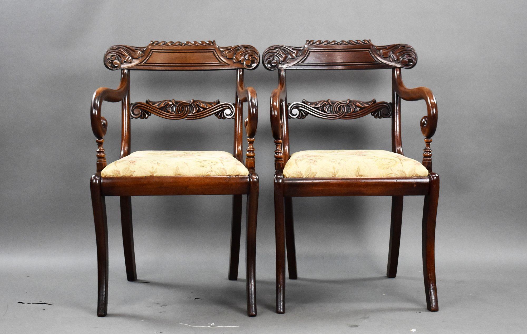 Pair of Antique Mahogany Carver Chairs, circa 1900
This fine pair of antique mahogany carver chairs dates to around 1900 and showcases beautifully executed craftsmanship in the late Regency or early Victorian style. Constructed from solid mahogany,