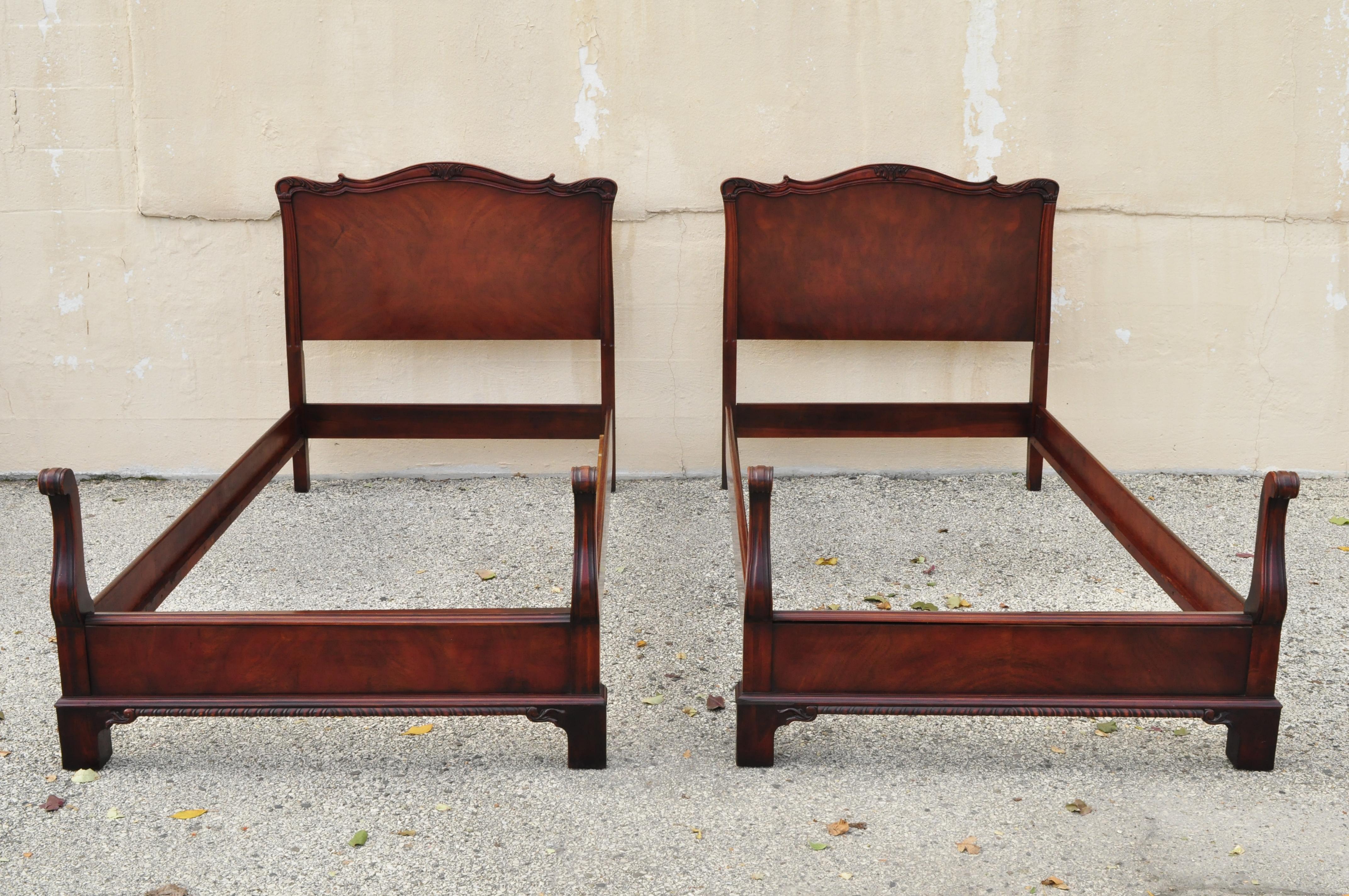 Pair of antique mahogany Chinese Chippendale twin single carved bed frames
Listing includes (2) headboards, (2) footboards, (4) rails, solid wood frame, beautiful wood grain, nicely carved details, very nice vintage item, circa early 20th century.