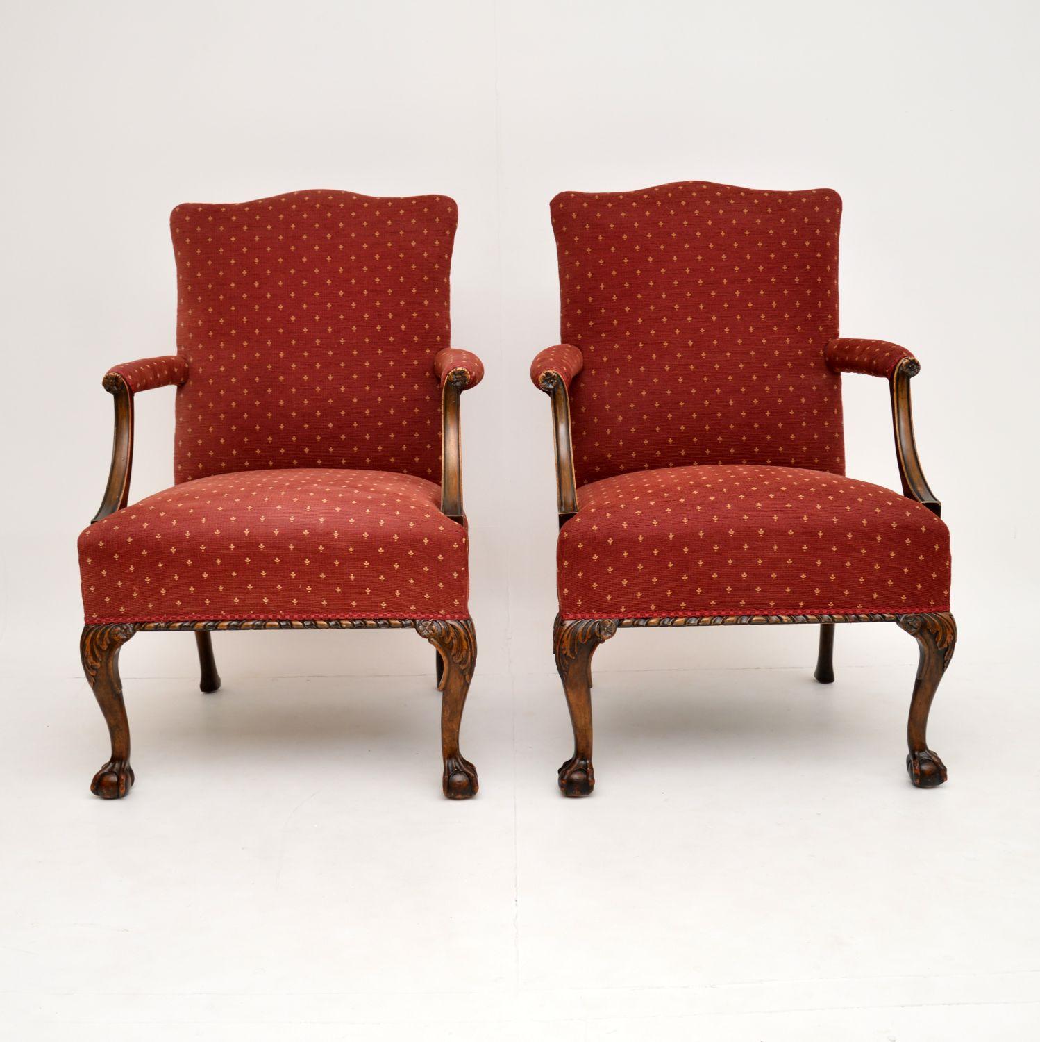 A smart and handsome pair of antique carved mahogany armchairs, in the Chippendale style. These date from circa 1890-1910 period.

They are of very fine quality, with lovely carving around the base and tops of the legs, plus they have ball & claw