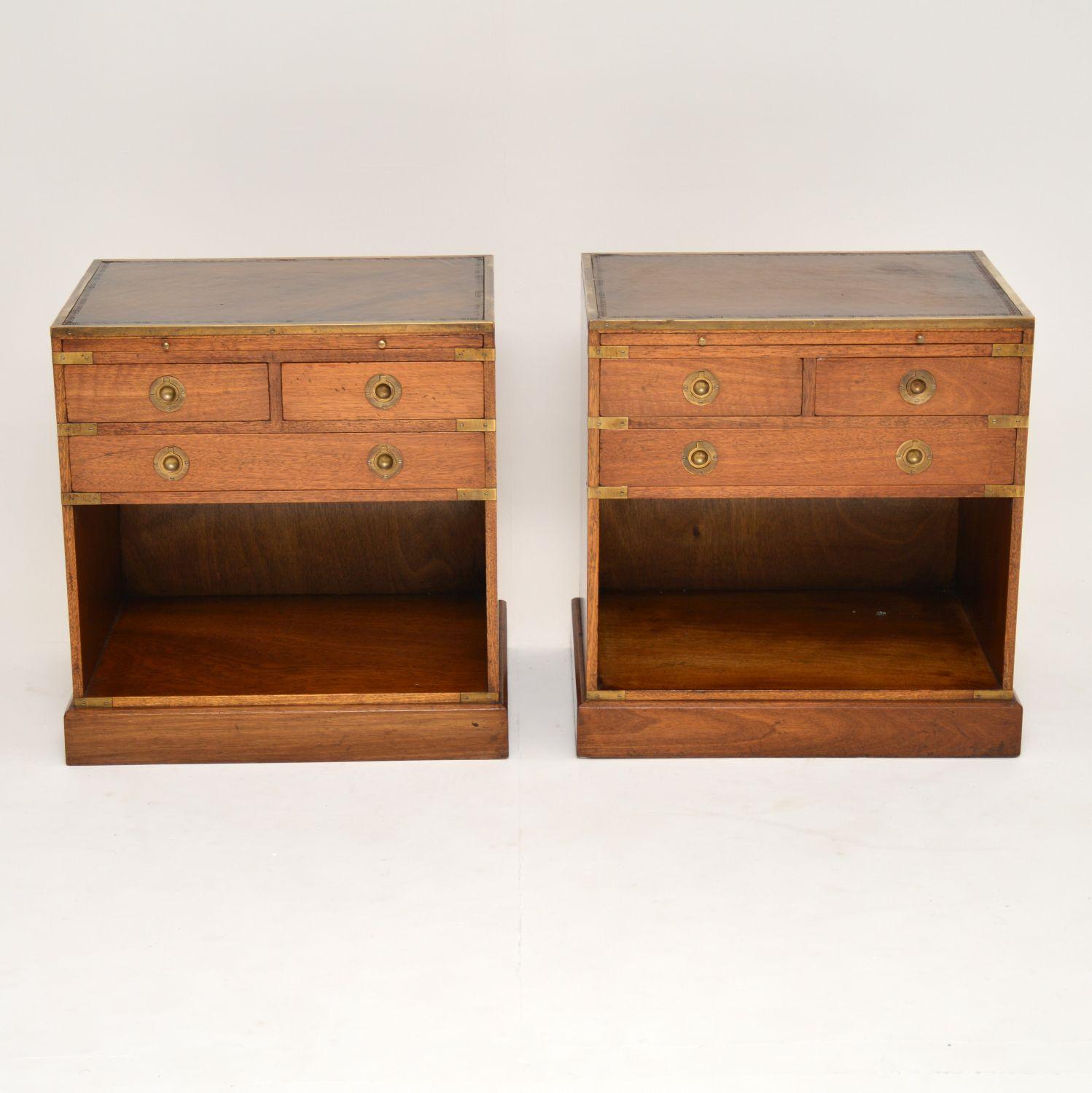 Pair of antique mahogany military Campaign style side cabinets in very good original condition & with some nice features. They have great proportions & would be ideal as general side cabinets in a living room or even as bedside cabinets. These