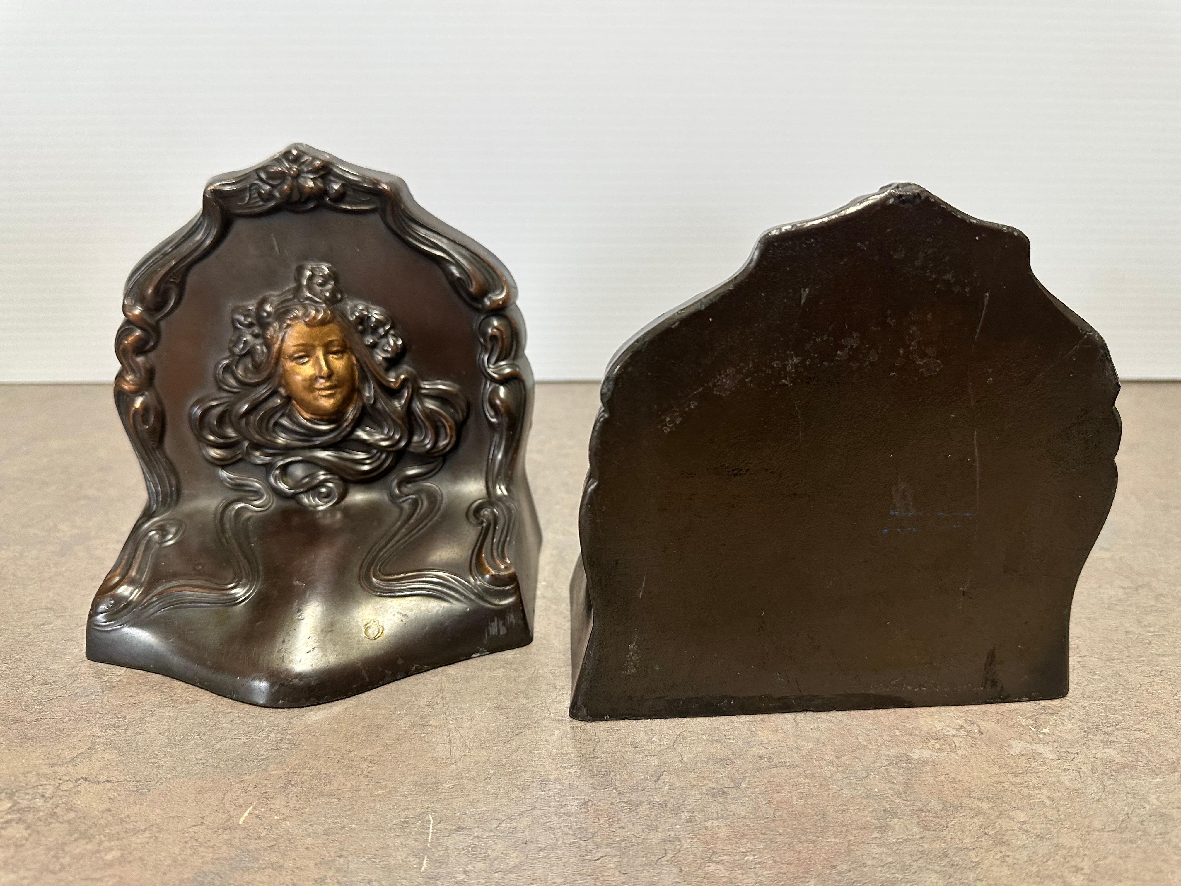 Coppia di fermalibri antichi in stile Art Nouveau 