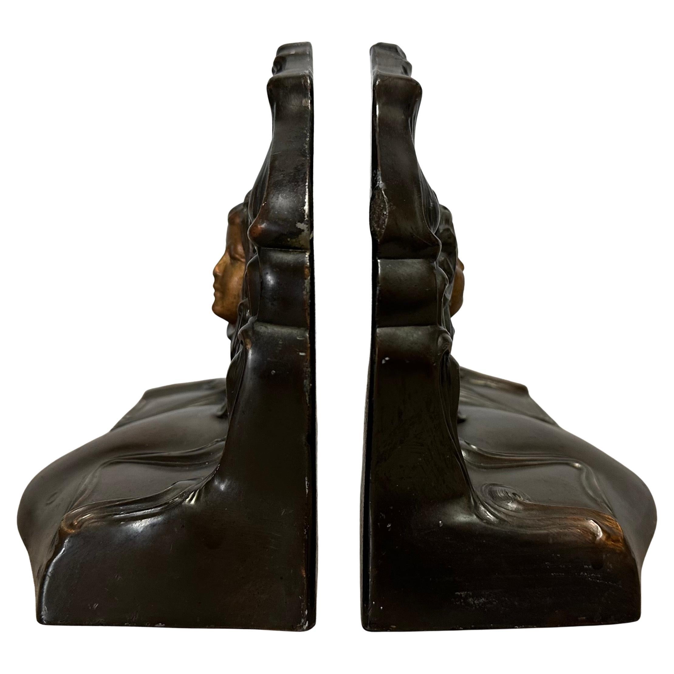 Coppia di fermalibri antichi in stile Art Nouveau 