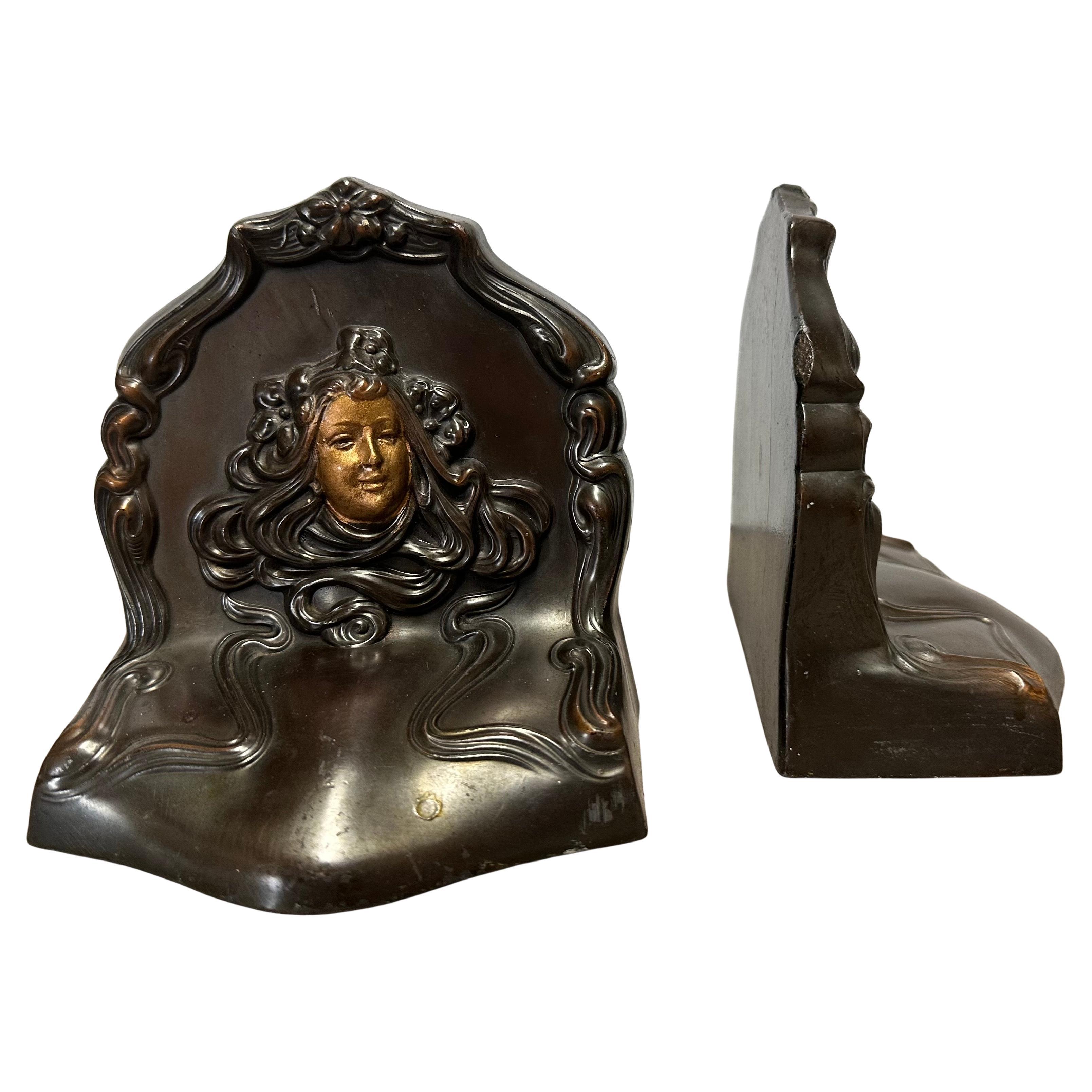 XX secolo Coppia di fermalibri antichi in stile Art Nouveau 