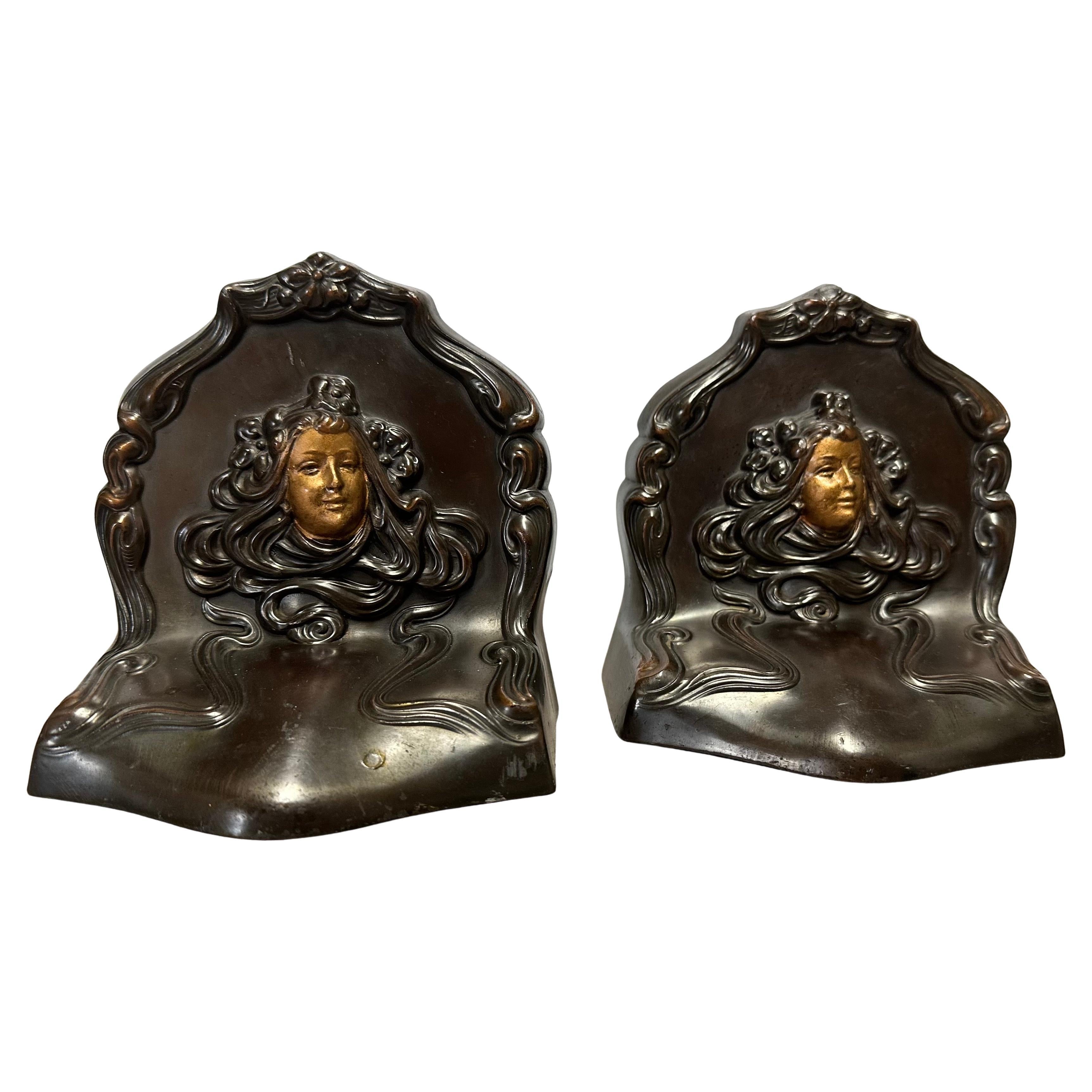 Bronzo Coppia di fermalibri antichi in stile Art Nouveau 