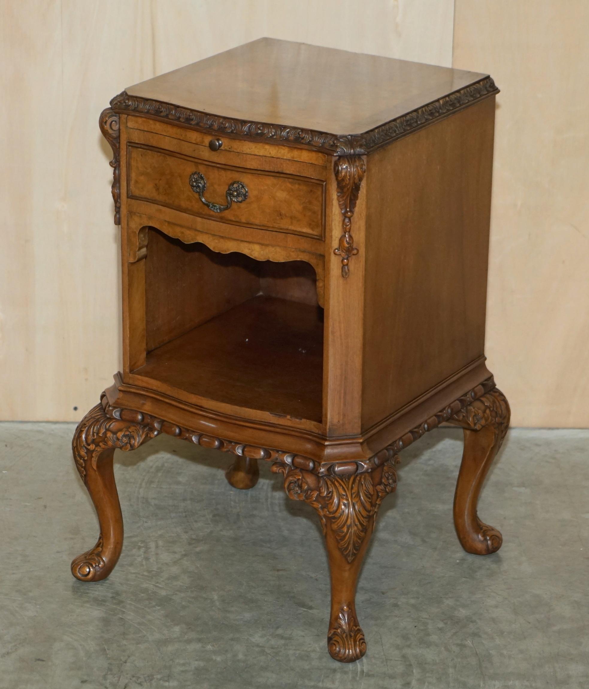 We are delighted to offer for sale this very fine pair of Maple & Co London Burr Walnut side tables with heavily carved cabriolet legs and mirrored top butlers slip serving trays, which are part of a large suite

This pair are part of a suite as