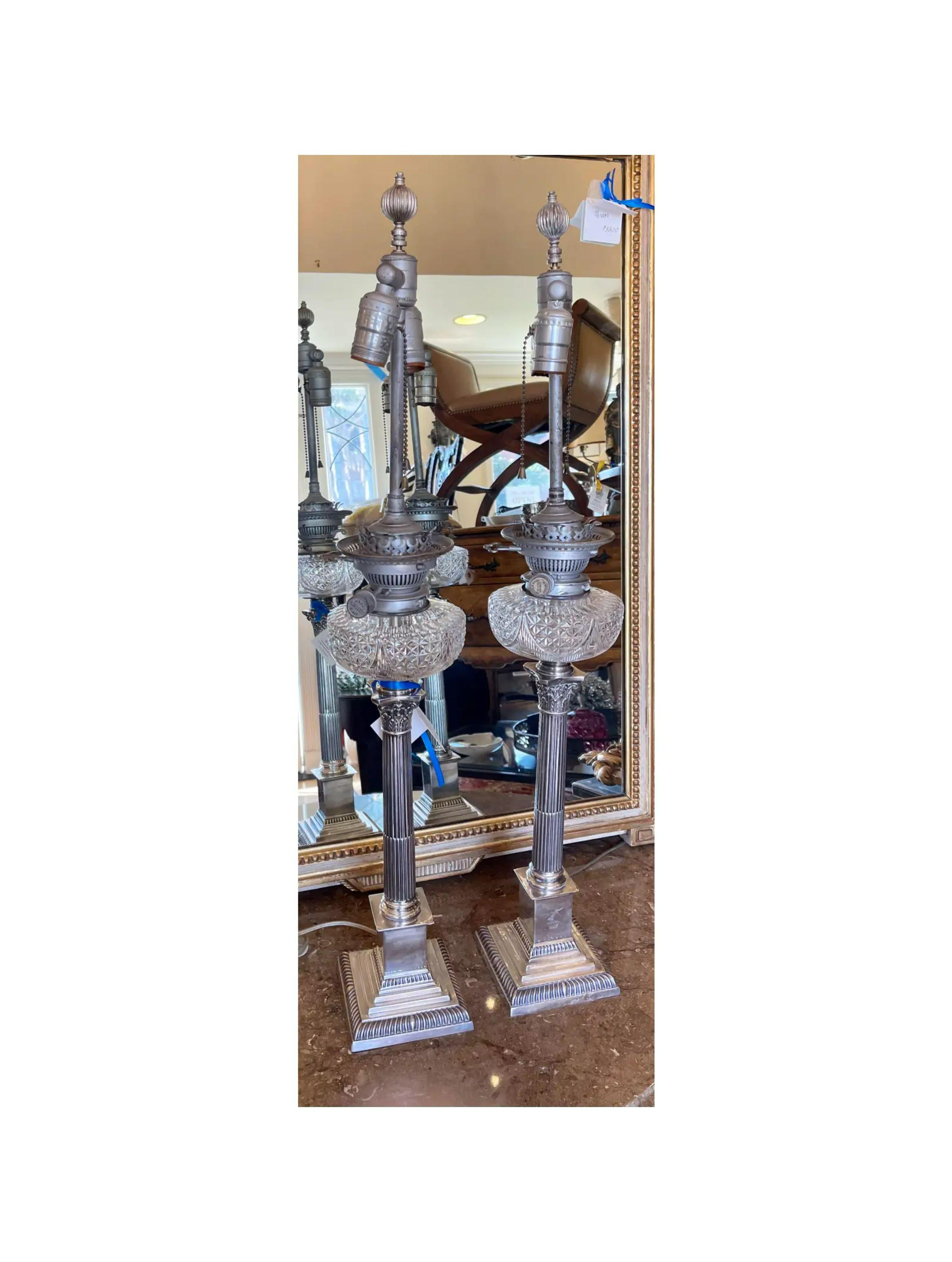 Antique Mappin & Webb Neoclassical Column silver & cut crystal table lamps - a Pair. Once oil lamps, these silver plated lamps were later electrified remaining the original oil pots.

Additional information: 
Materials: Crystal, Lights, Polished