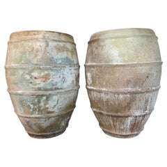 Pair of Antique Mediterranean Terracotta Storage Jars with Weathered Patina