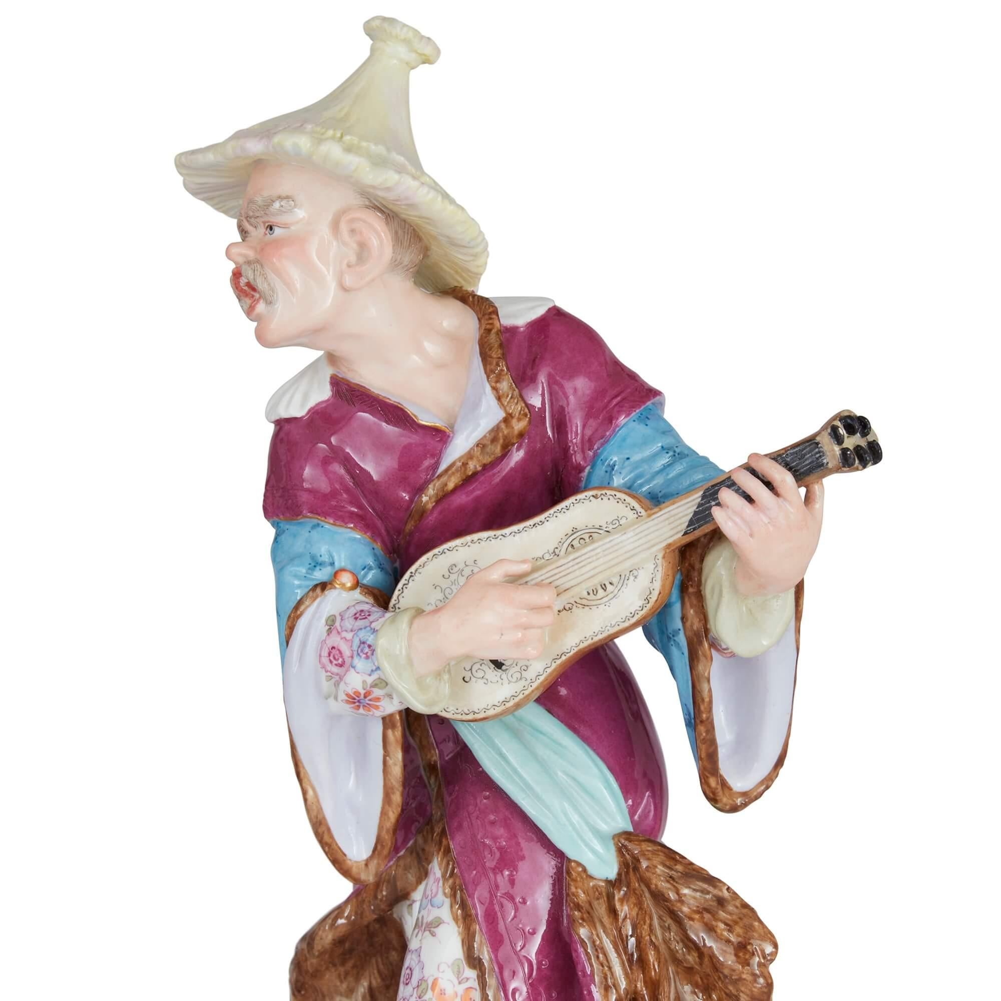 Gilt Pair of Antique Meissen Porcelain Figures of Malabar Musicians For Sale