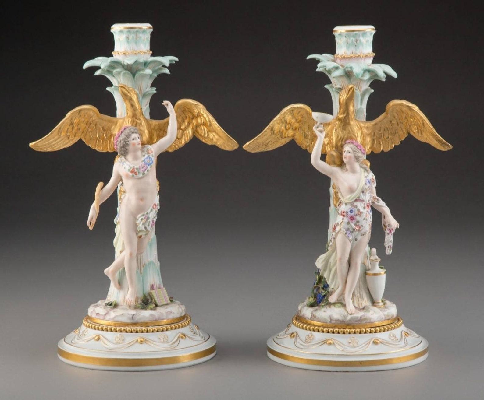 A scarce pair of magnificent Meissen polychrome and partial gilt porcelain candlesticks, inspired by Greek mythology, exquisitely hand-crafted in Rococo taste, Germany, 19th century.

The stunning, exceptionally executed, very fine quality antique