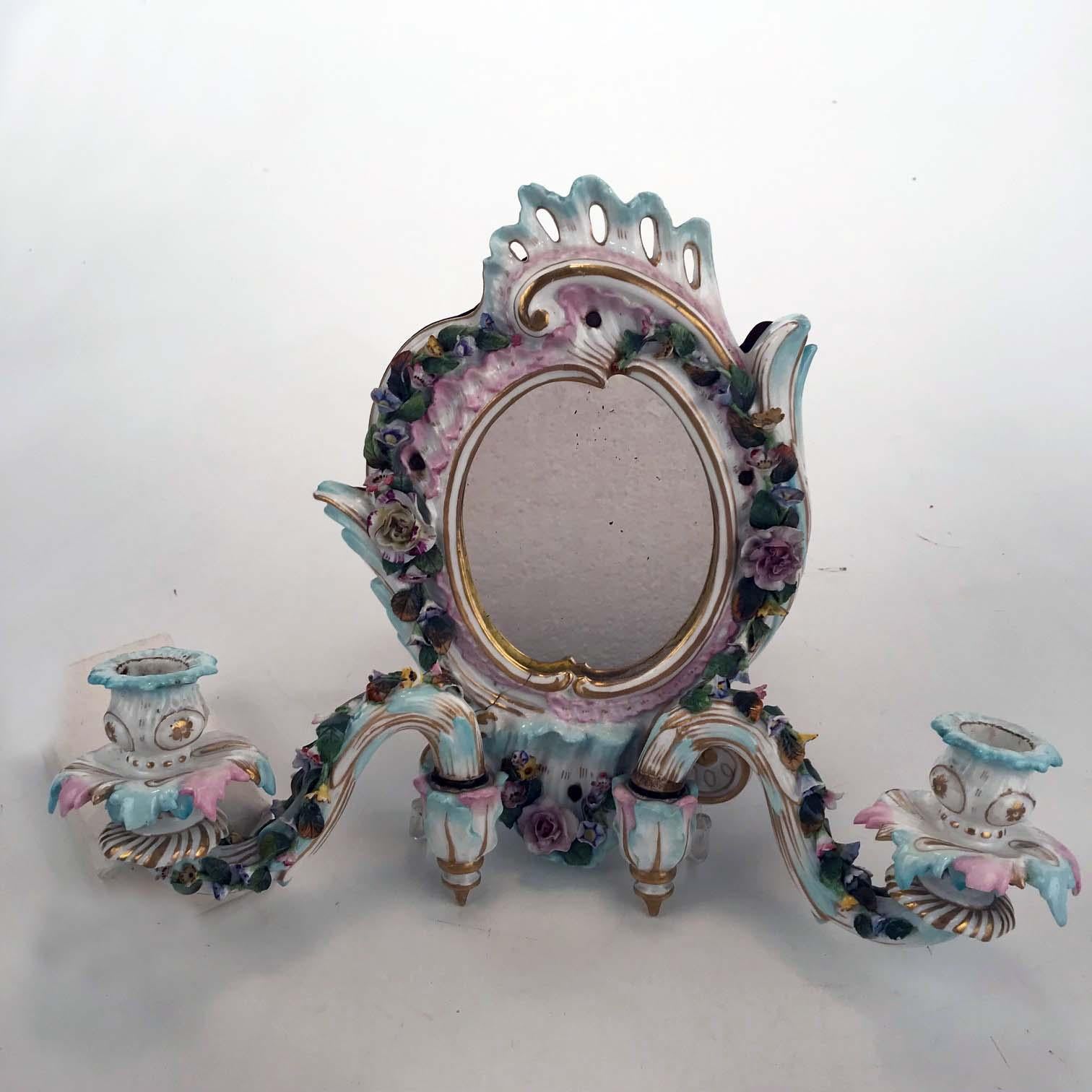These sconces are highly decorative and desirable and display many of the qualities that make Meissen porcelain so world famous: the skill with which the wild flowers are applied, the subtle shading of the pink and pale green painting, the carefully