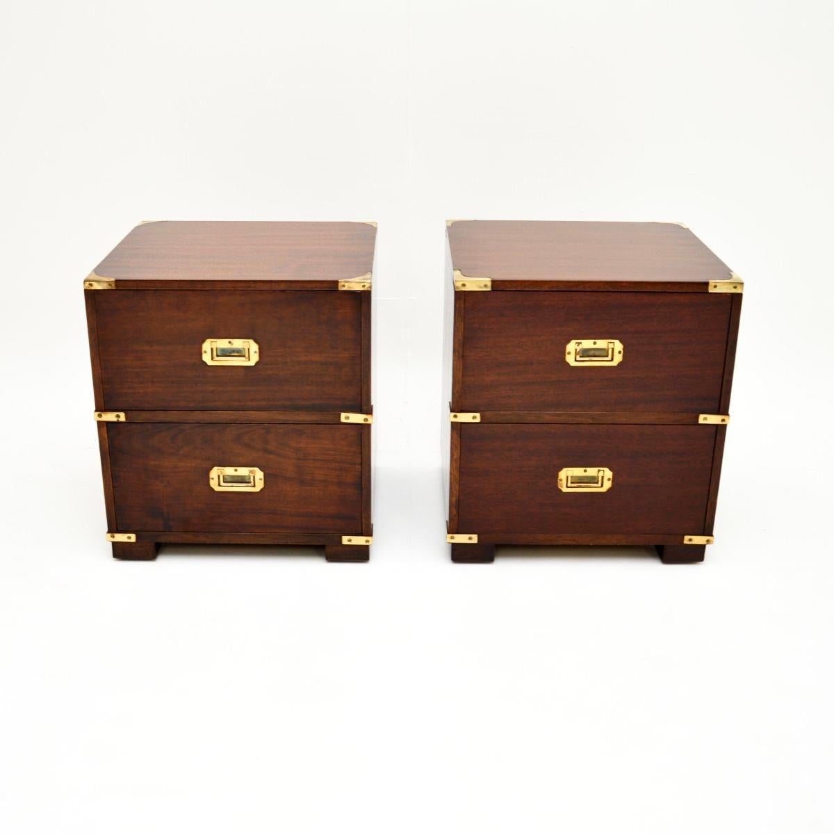 A fantastic pair of antique military campaign bedside chests. They were made in England, and date from around the 1930’s.

They are of superb quality and are a lovely size, perfect for use as bedside chests or even as side tables in a living room.