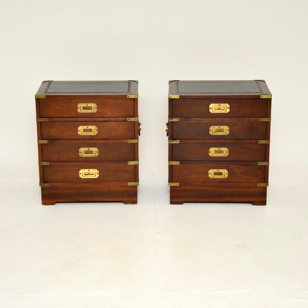 A fantastic pair of antique military campaign style bedside chests. They were made in England, and date from around the 1930’s.

They are of superb quality and are a lovely size, perfect for use as bedside chests or even as side tables in a living