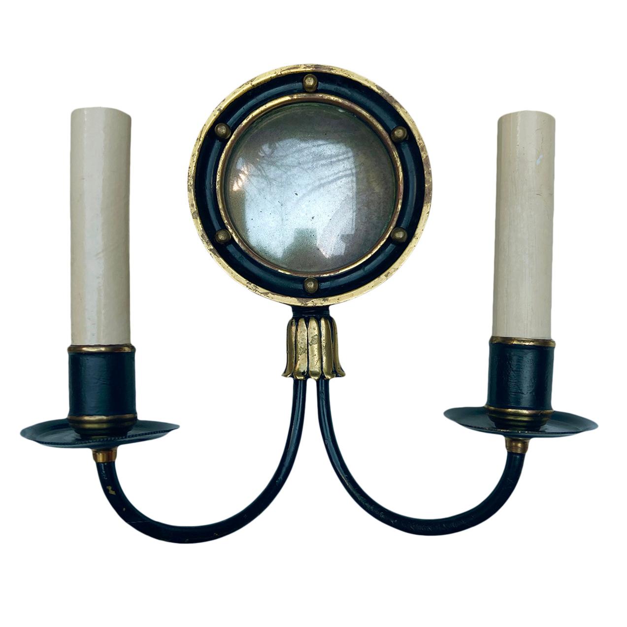 Pair of circa 1920's French sconces with mirrored backplates.

Measurements:
Height 8