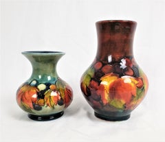 Pair of Antique Moorcorft Art Pottery Vases with Flambe in Leaf & Berry Pattern
