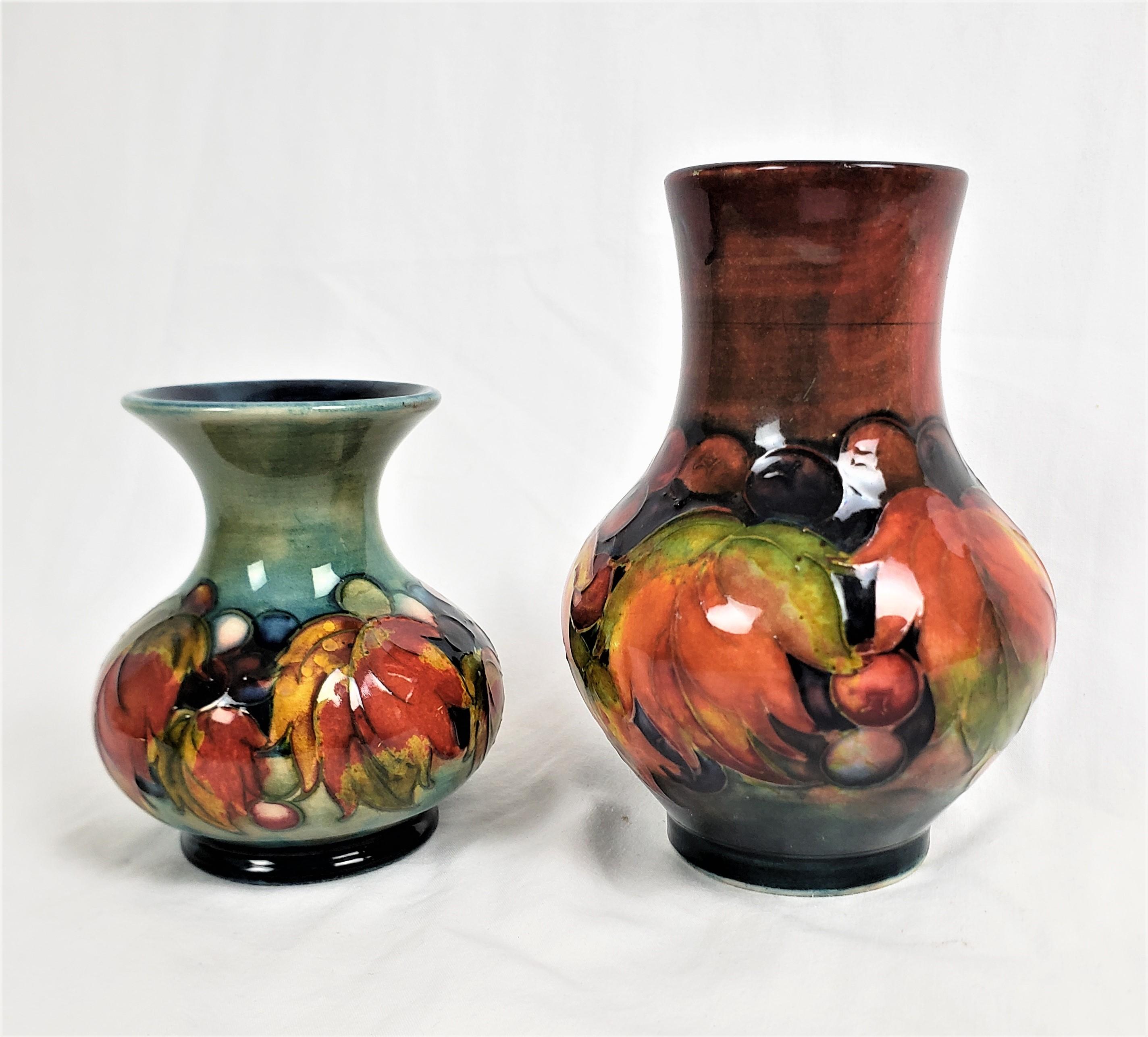 Hand-Crafted Pair of Antique Moorcorft Art Pottery Vases with Flambe in Leaf & Berry Pattern For Sale