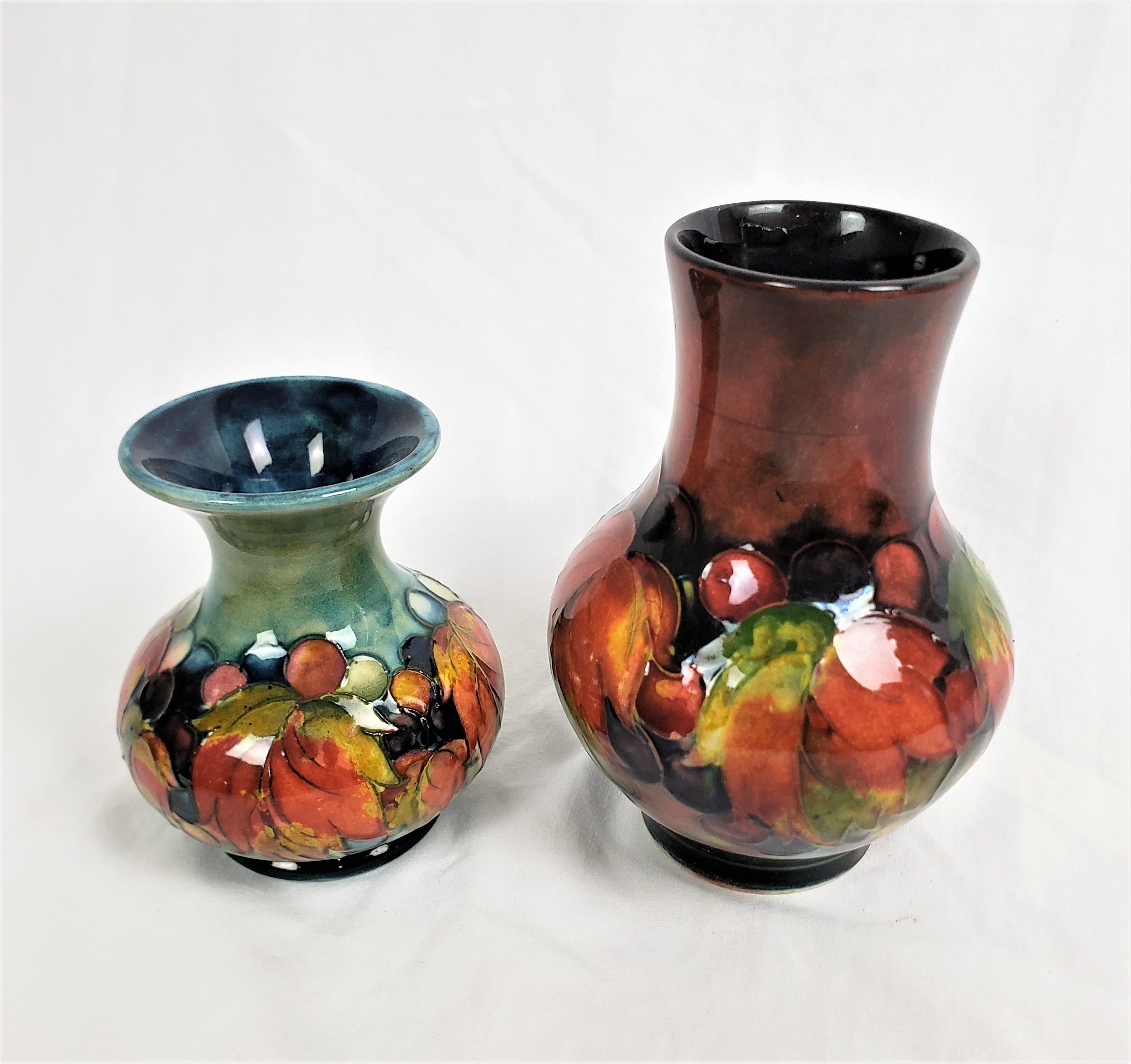 Pair of Antique Moorcorft Art Pottery Vases with Flambe in Leaf & Berry Pattern In Good Condition For Sale In Hamilton, Ontario