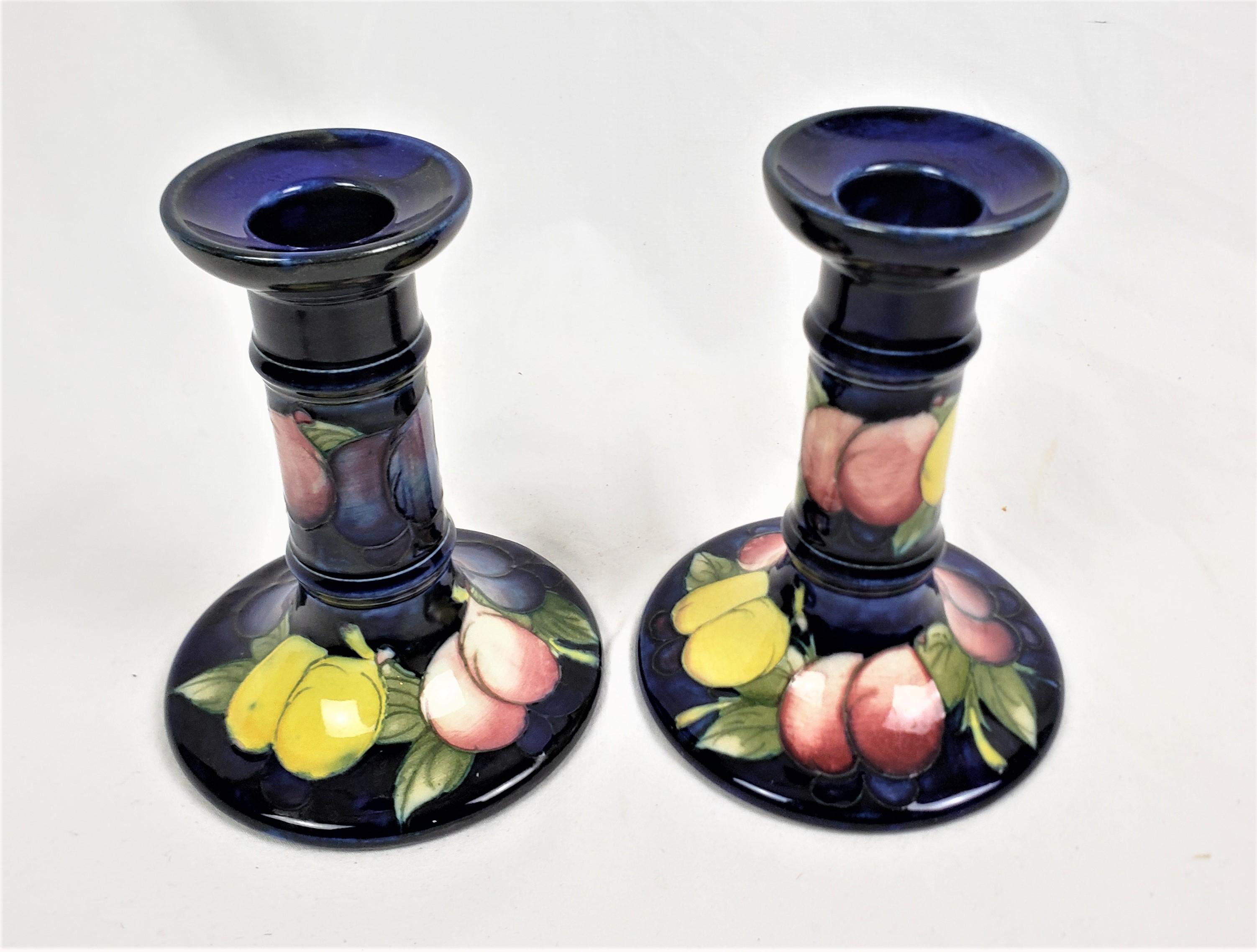English Pair of Antique Moorcroft Art Pottery Candlesticks in the Wisteria Pattern For Sale