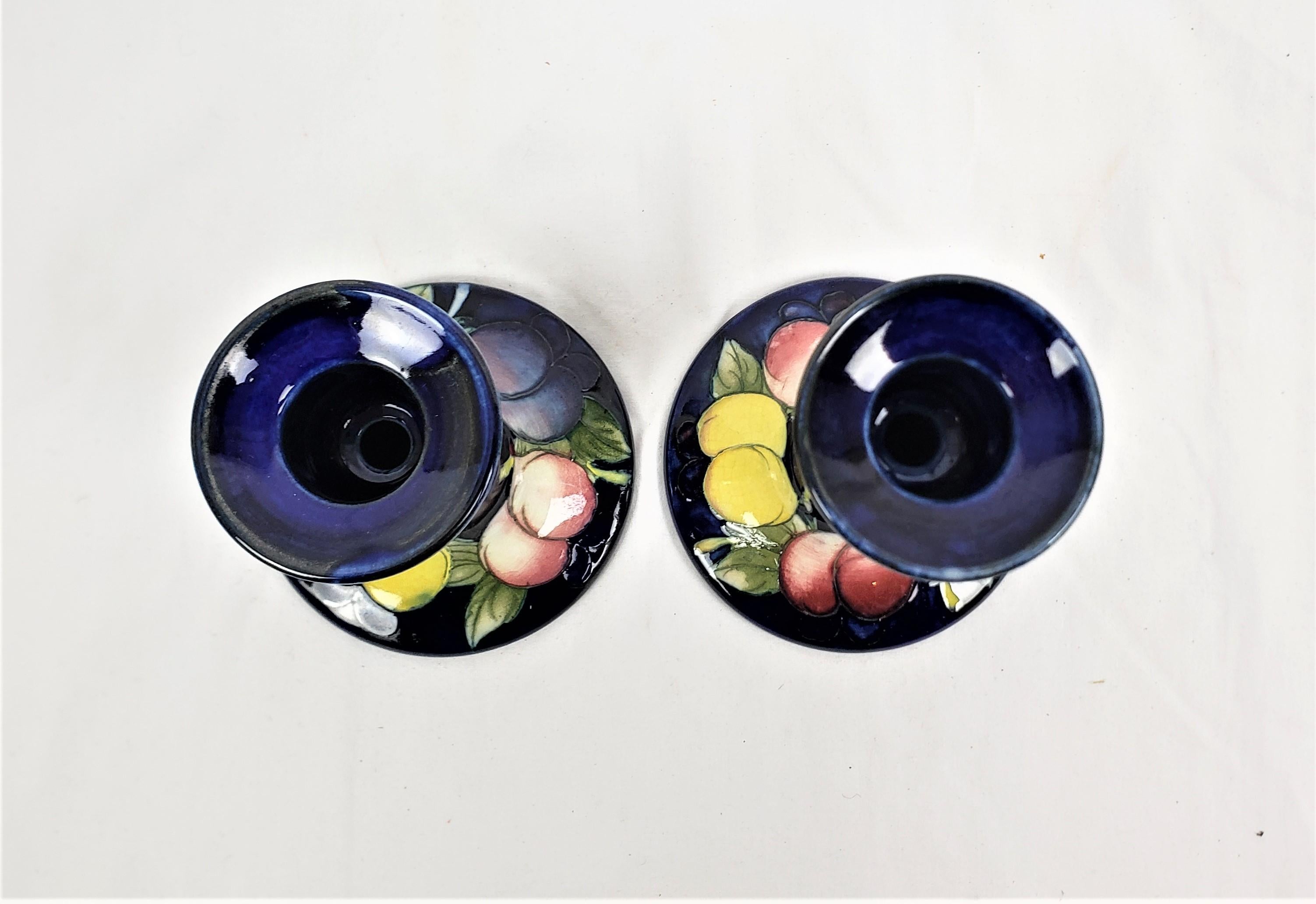 Pair of Antique Moorcroft Art Pottery Candlesticks in the Wisteria Pattern In Good Condition For Sale In Hamilton, Ontario