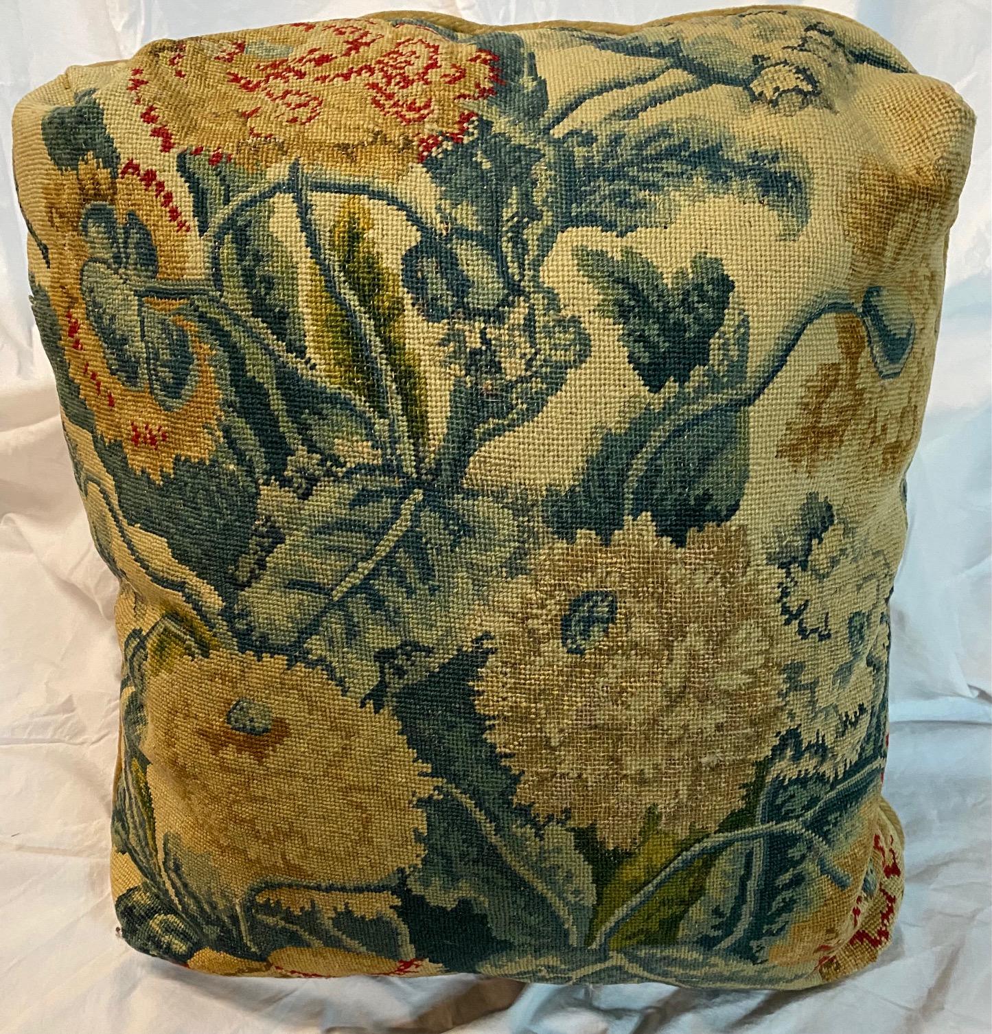 Pair of needlework floral cushions with velvet backing.
18th century
Measures: 18