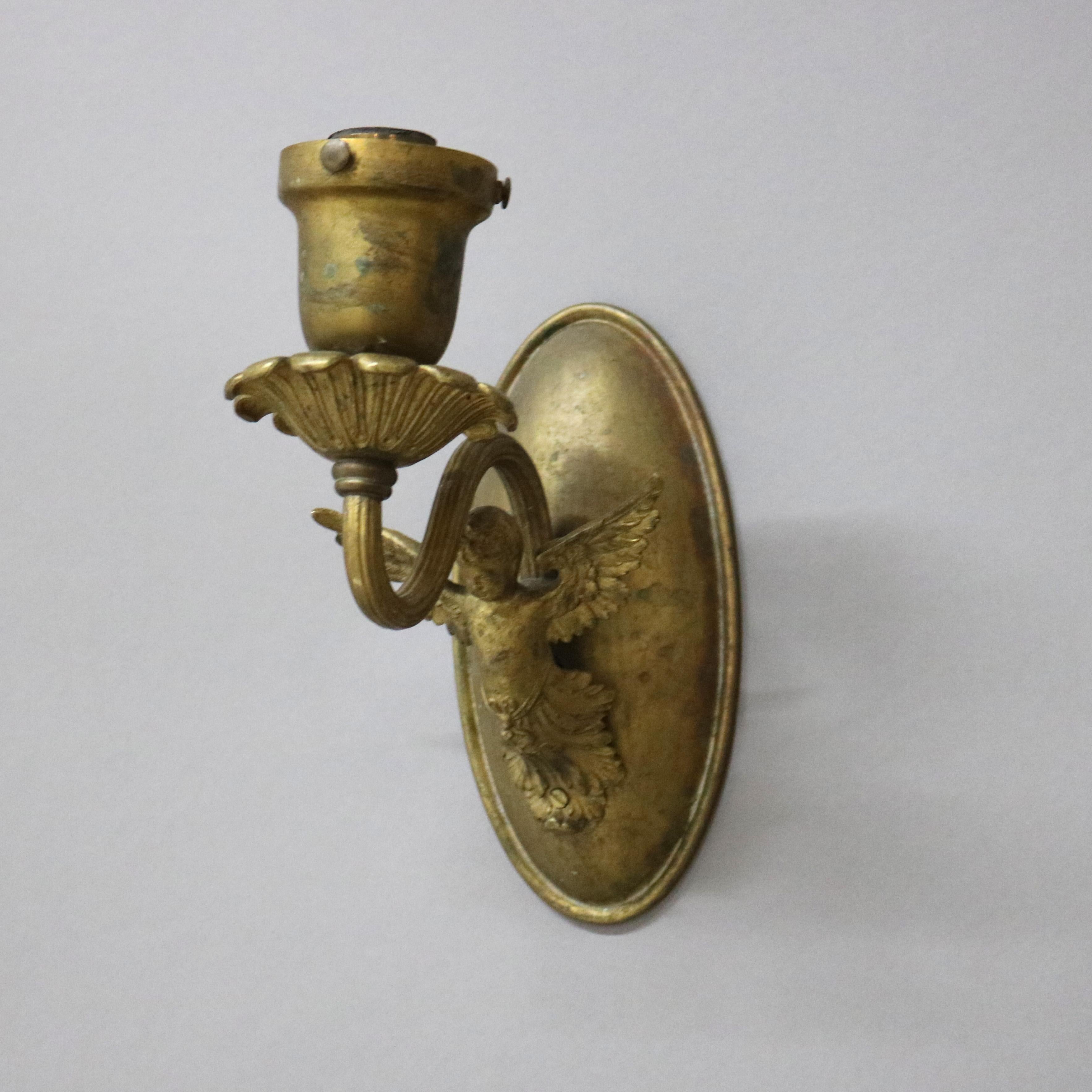 20th Century Pair of Antique Neoclassical Figural Cherub Brass Single Light Wall Sconces