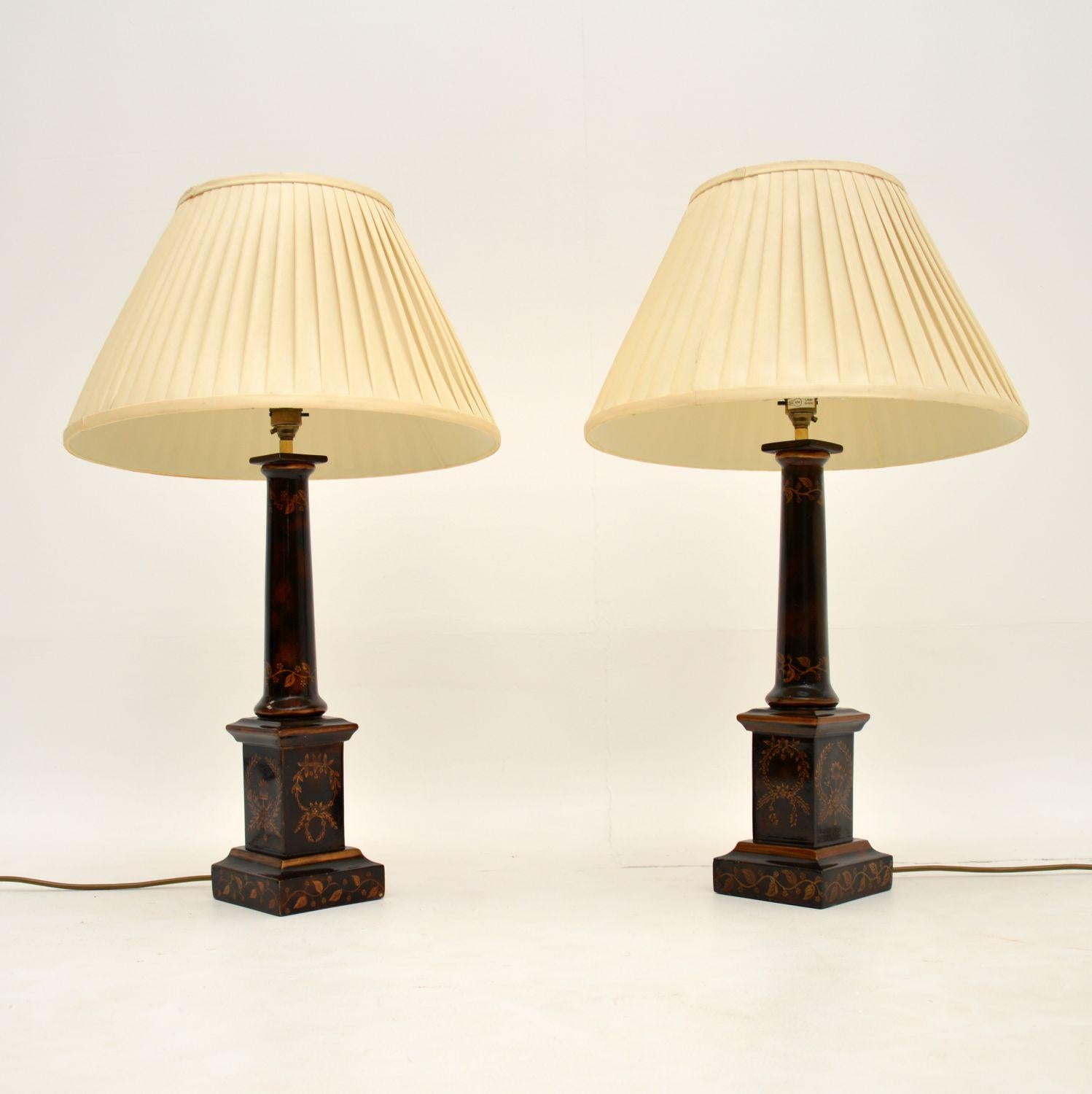 A stunning pair of vintage table lamps in the antique neoclassical style. These were made in England, they date from around the 1960’s.

The quality is excellent, they are finished in a beautiful painted design and have a gorgeous colour.

The
