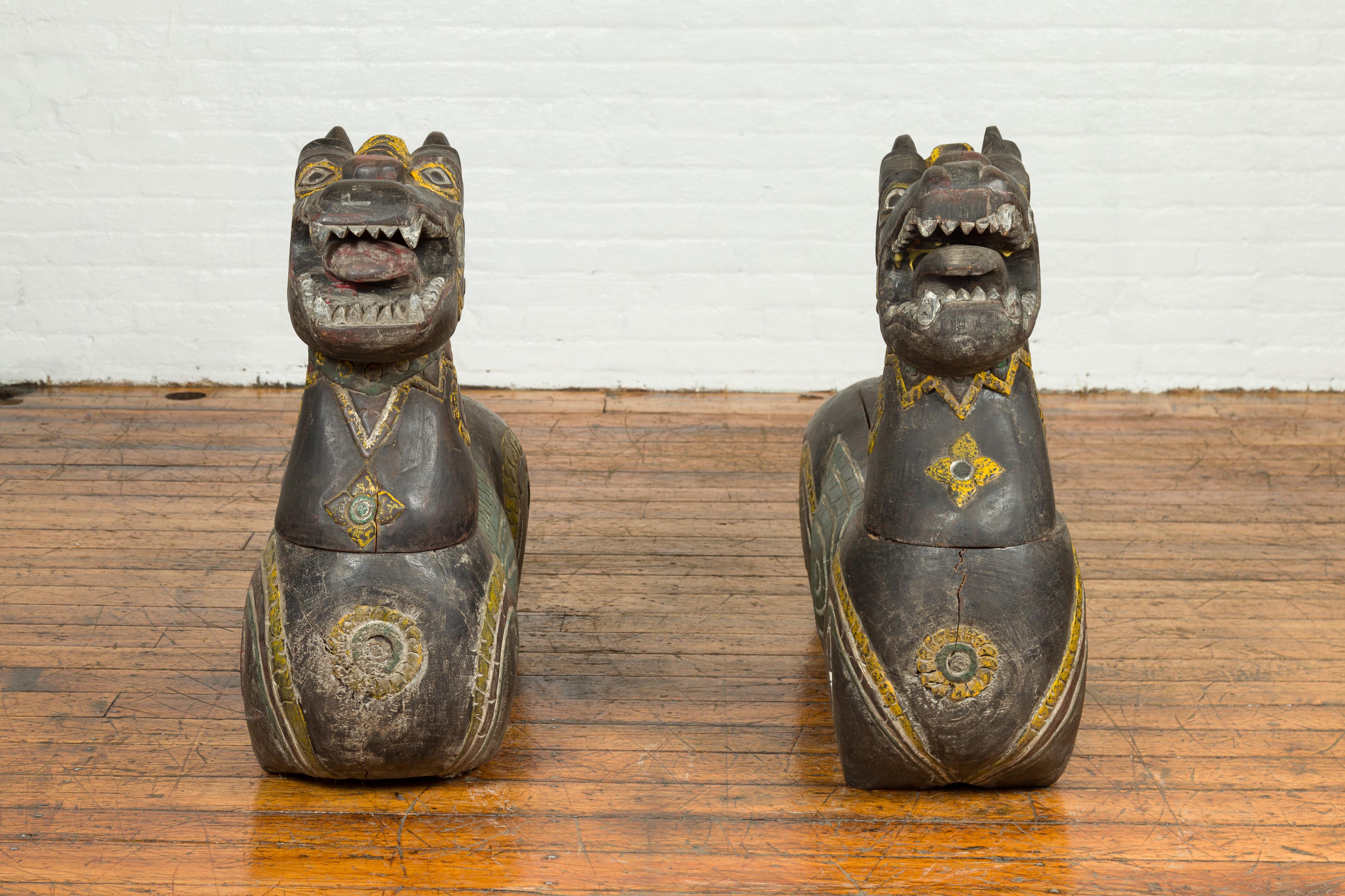 Hand-Carved Pair of Antique Northern Thai Carved and Polychrome Mythical Guardian Animals For Sale