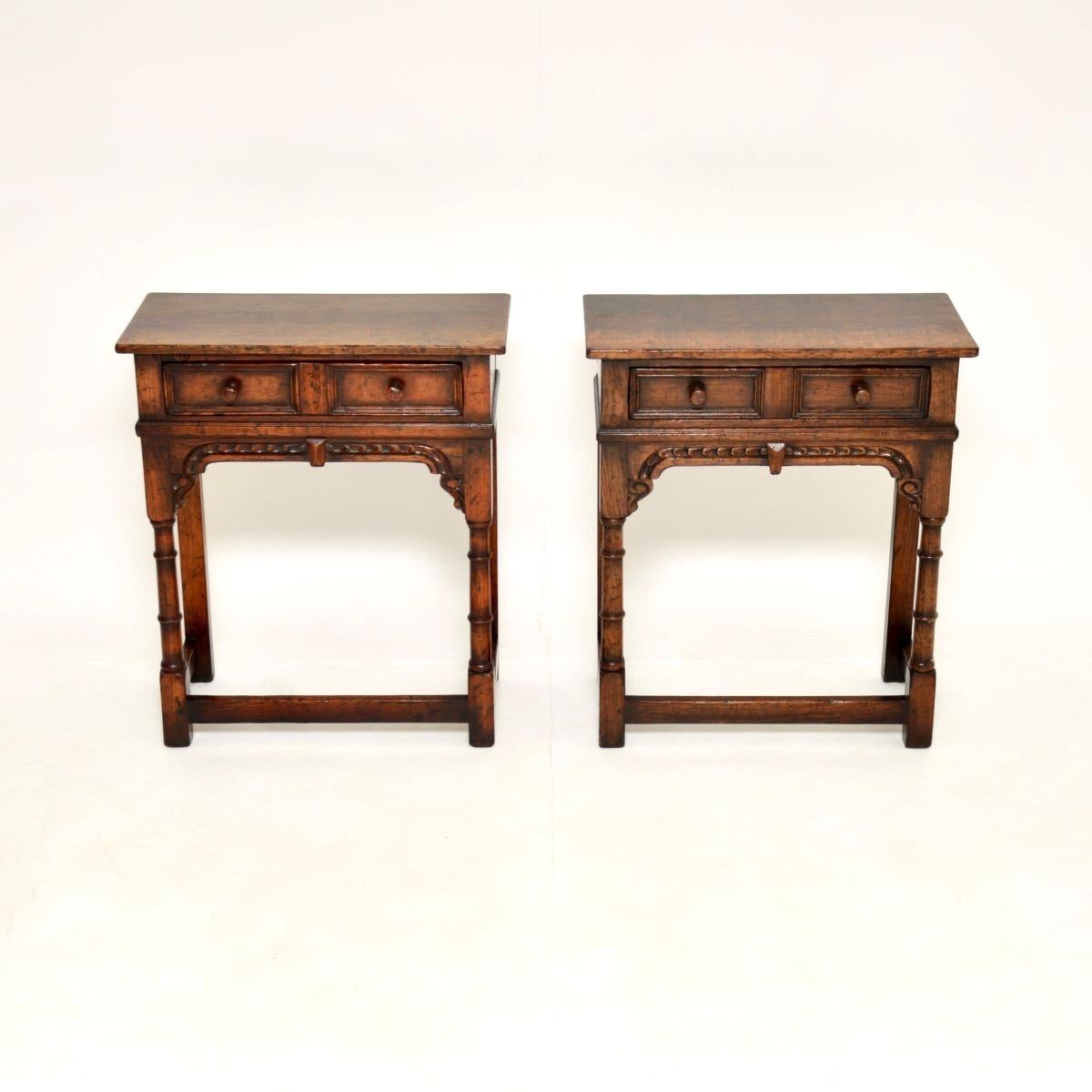 A wonderful pair of antique oak console / side tables by Titchmarsh and Goodwin. They were made in England, they are in the Jacobean style and date from around the mid-twentieth century.

They are beautifully designed, full of character and charm.
