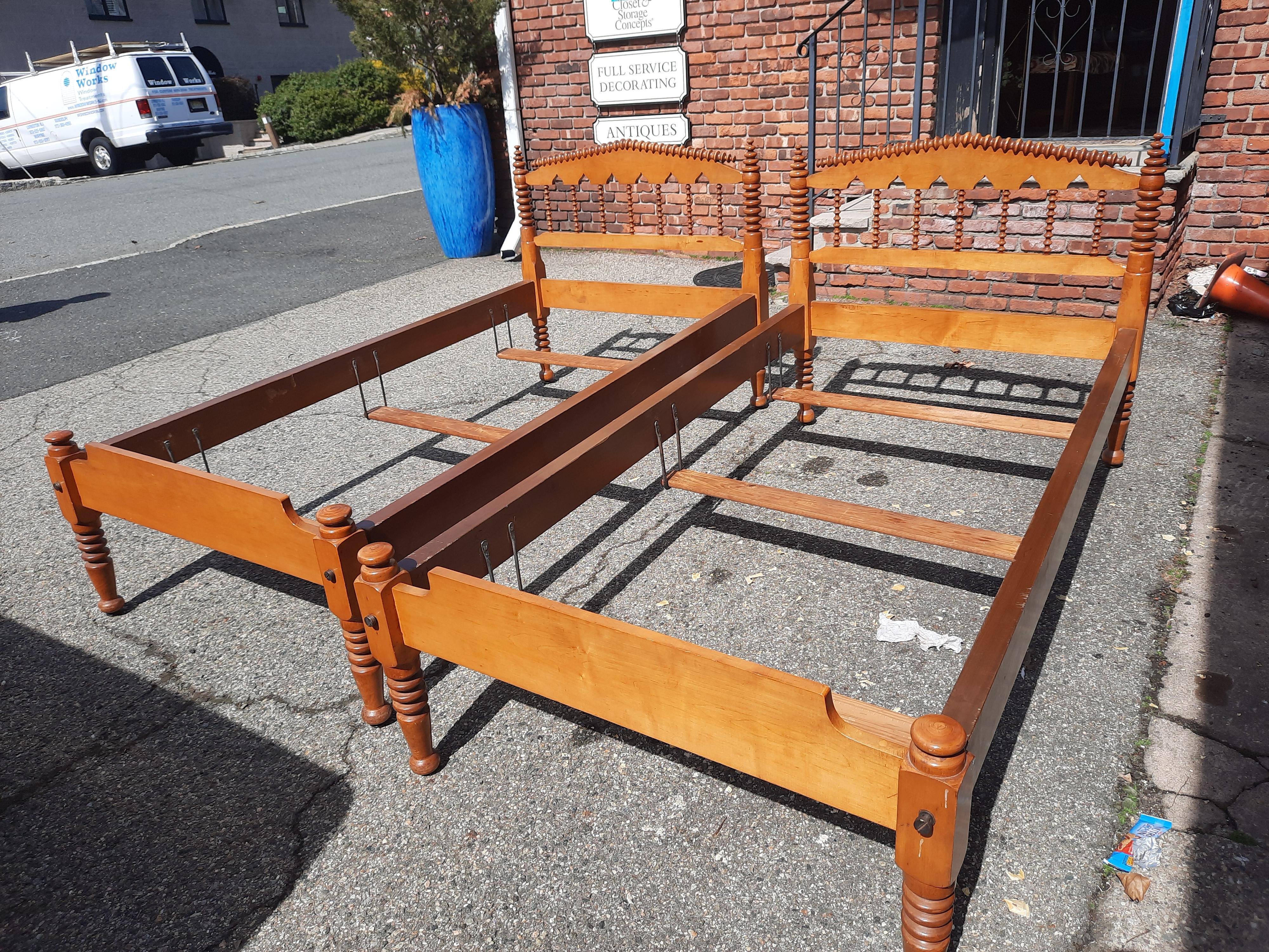 Unique pair of American Maple twin beds. The set includes 2 headboards, 2 foot boards with side rails and mattress/box-spring supports. Hand-forged iron brackets, which support the box-spring and mattress, are attached to the side rails. See all