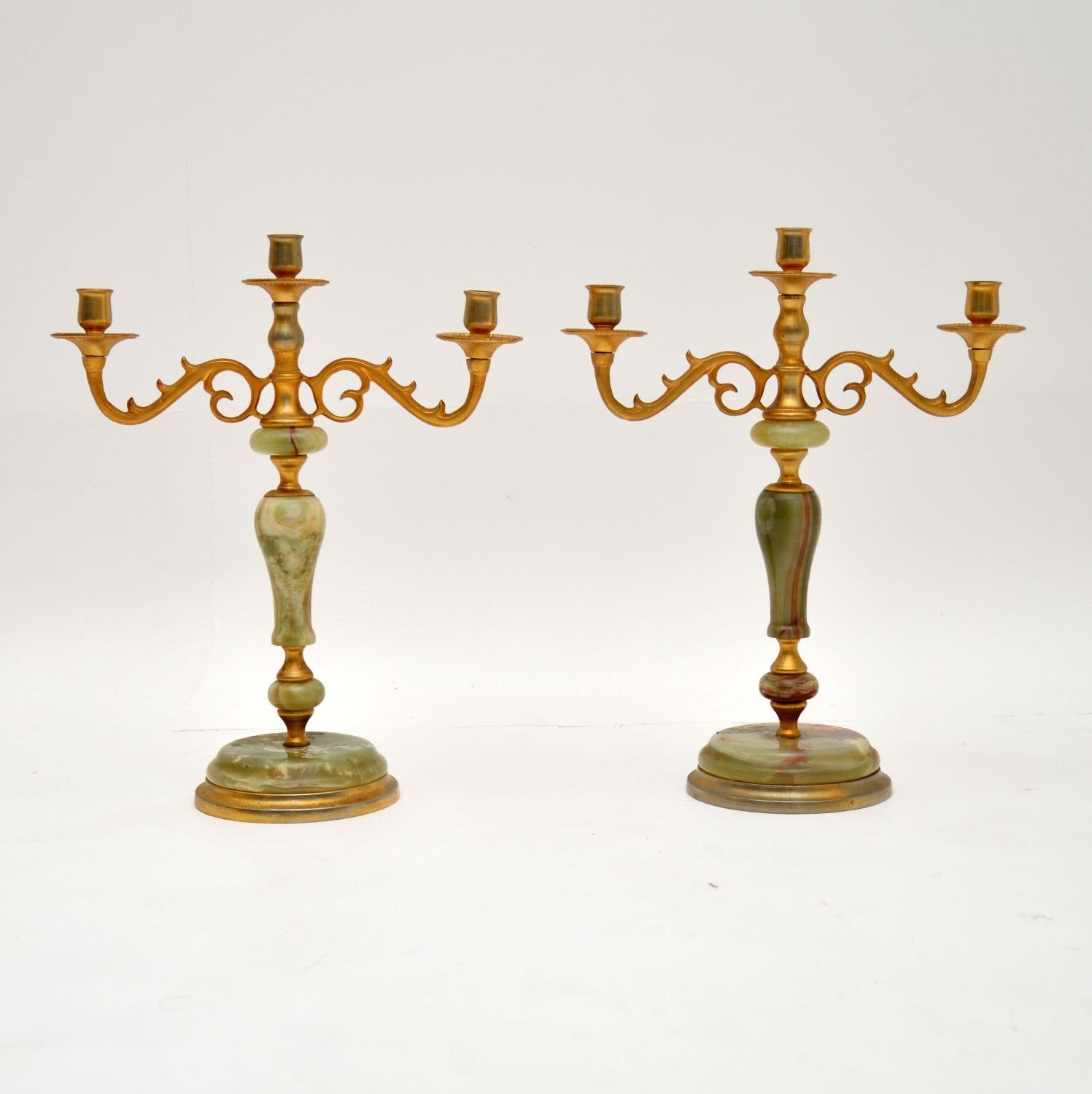 A beautiful pair of antique candelabra, made from onyx and gilt metal & dating from around the 1930-50’s period.
It is unusual to see a pair like this in onyx, they are very well made and have a lovely design.
The condition is excellent for their