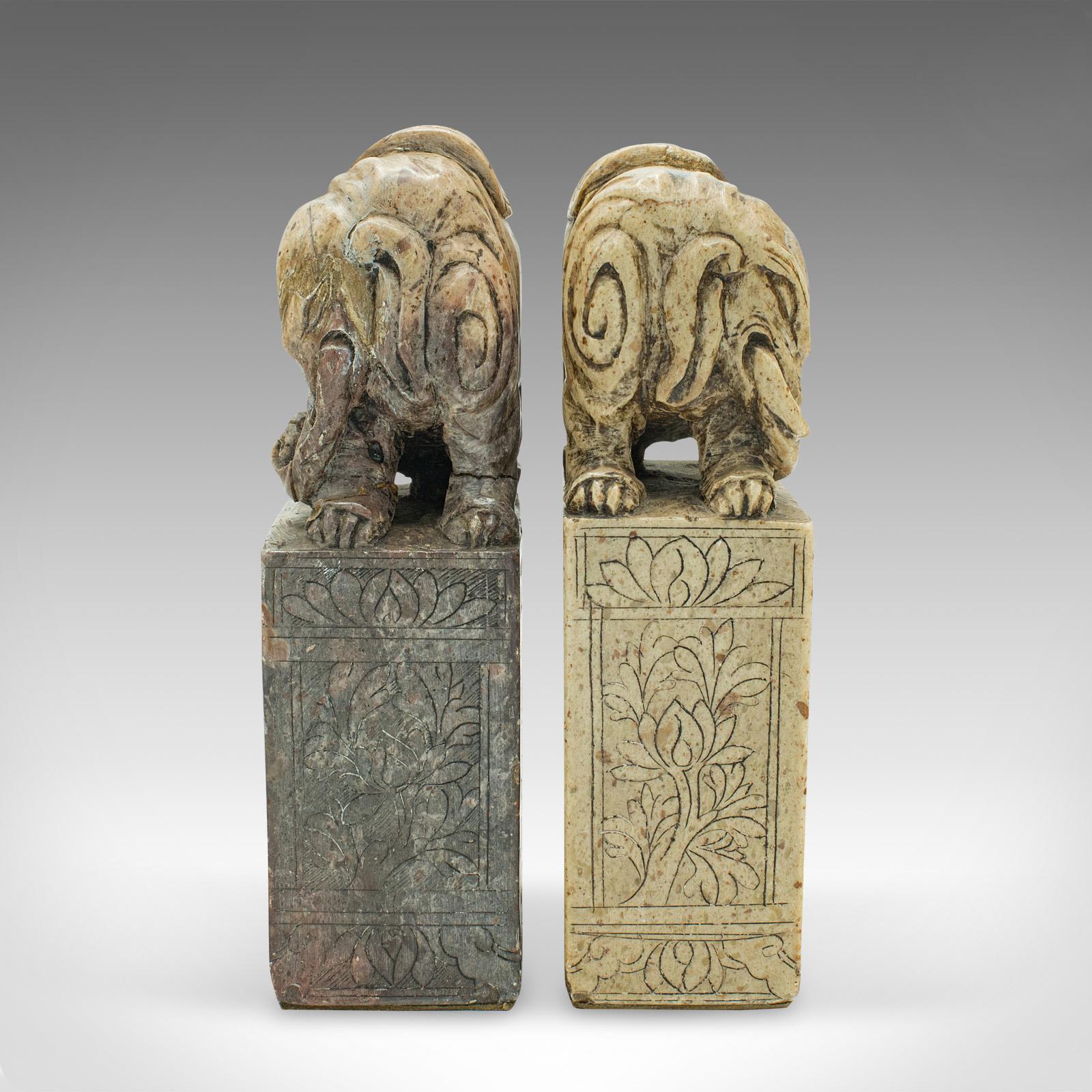 This is a pair of antique Oriental bookends. A Chinese, carved soapstone decorative book rest, dating to the early Victorian period, circa 1850.

Fascinating and distinctive bookends from the Qing period
Displaying a desirable aged patina and in