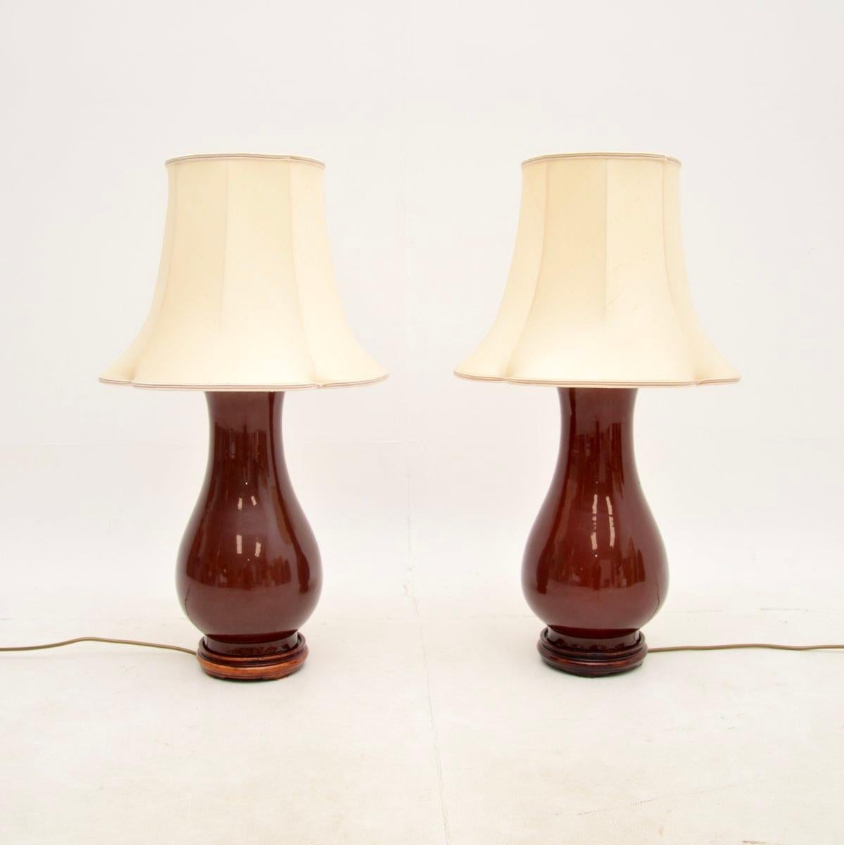 A fantastic pair of antique oriental style ceramic table lamps. They were made in England, they date from around the 1970’s.

The quality is outstanding, the are a large and impressive size. We have paired them with a gorgeous pair of vintage silk