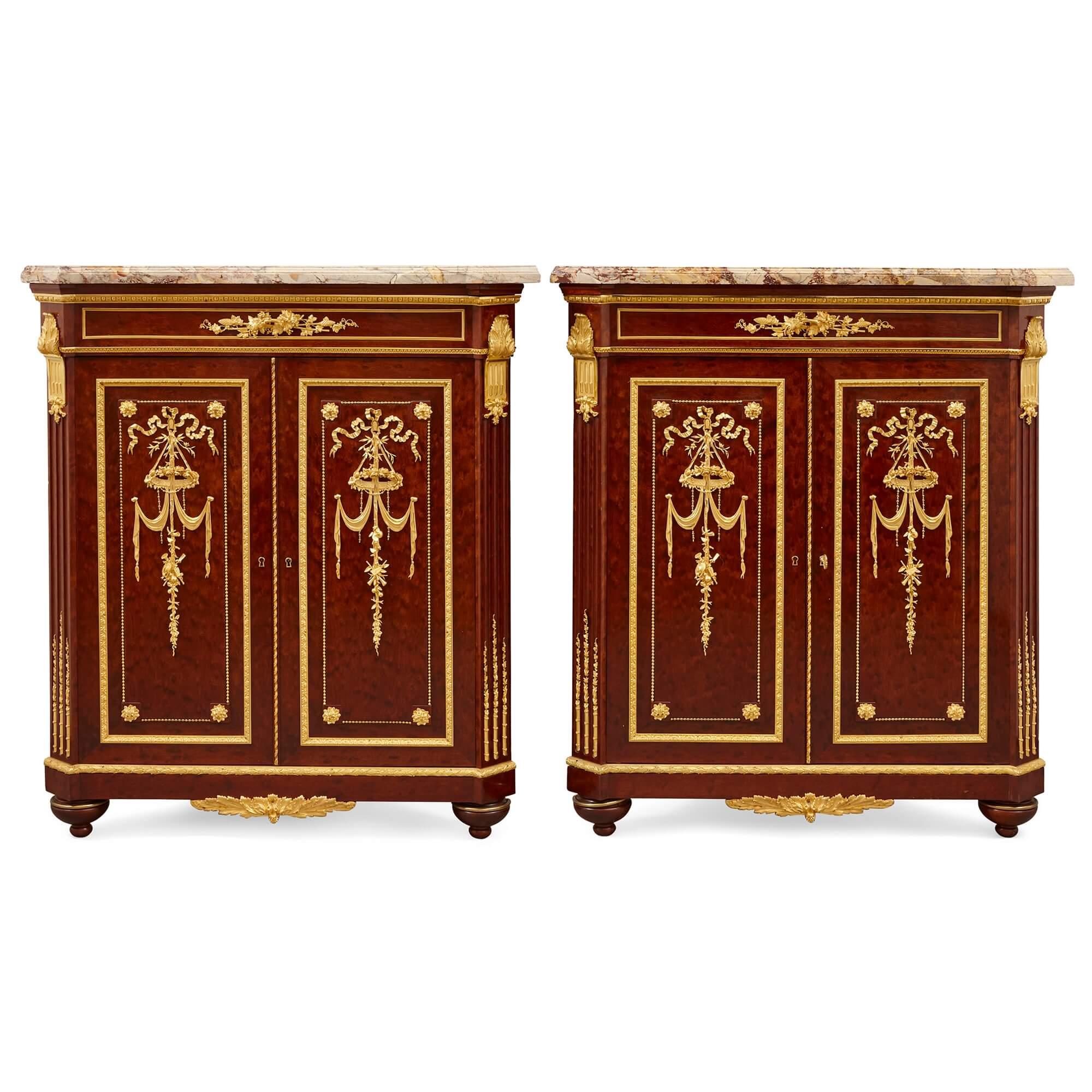 Pair of antique ormolu mounted and mahogany corner cabinets by Grohé Frères
French, c. 1860
Height 102cm, width 89cm, depth 47cm

This stunning pair of ormolu and mahogany corner cabinets were made by Grohé Frères in France in around 1860. The firm