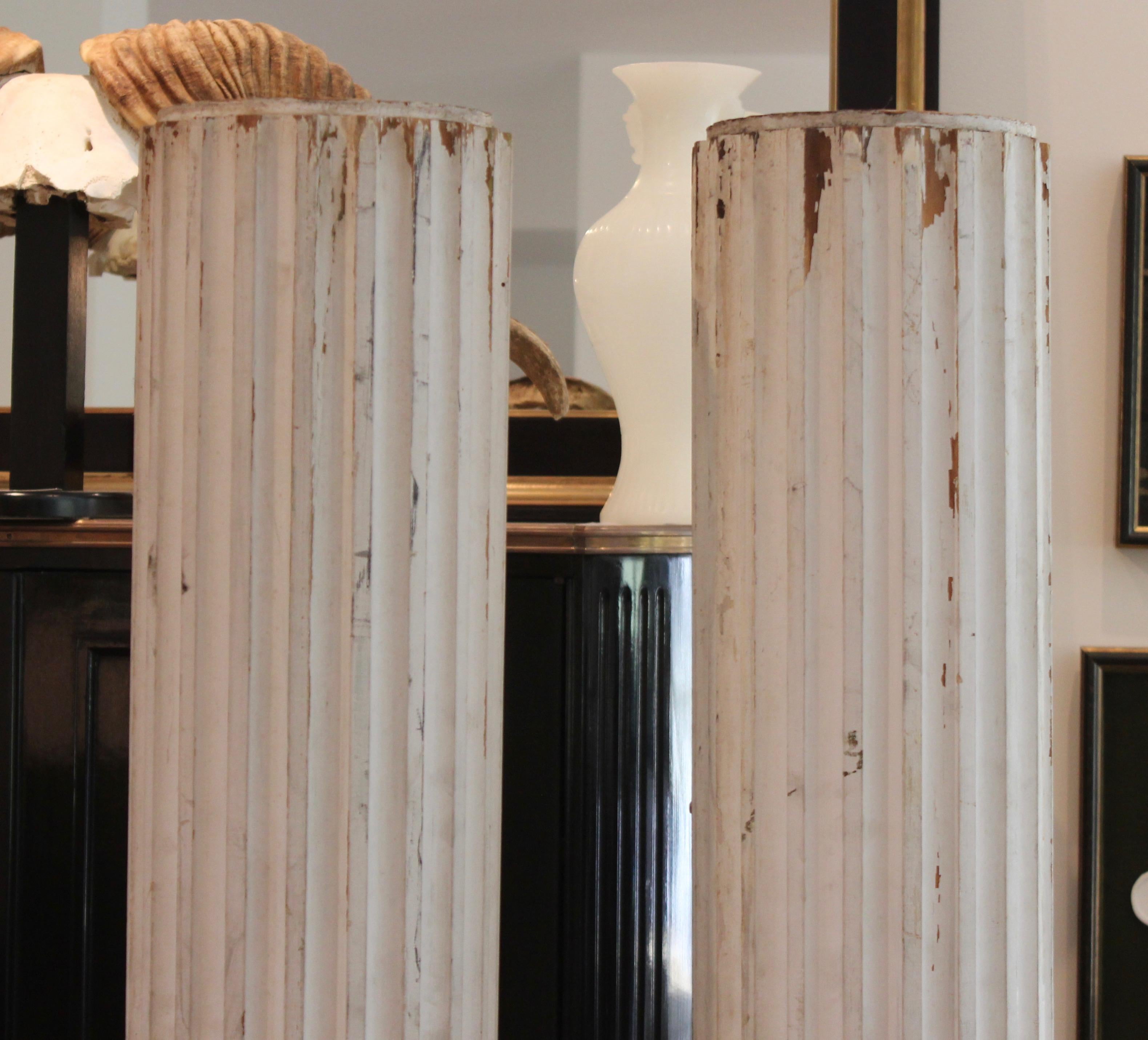 Pair of fluted painted columns.


  