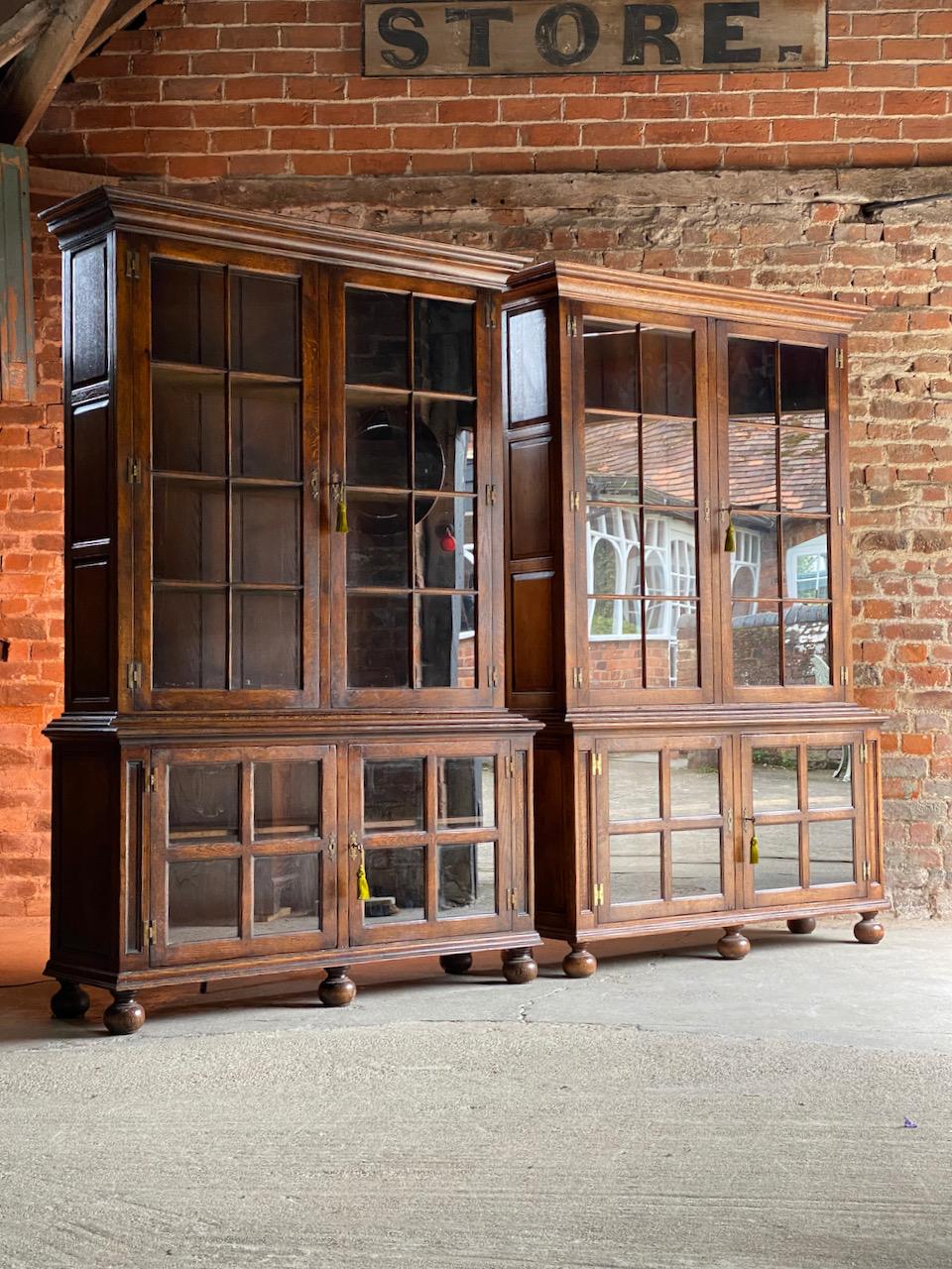 Pair of antique Pepys bookcases matching pair oak mid twentieth century

A magnificent pair of tall and imposing 18th century Pepys style solid English oak library bookcases dating to mid twentieth century England, the upper section with moulded
